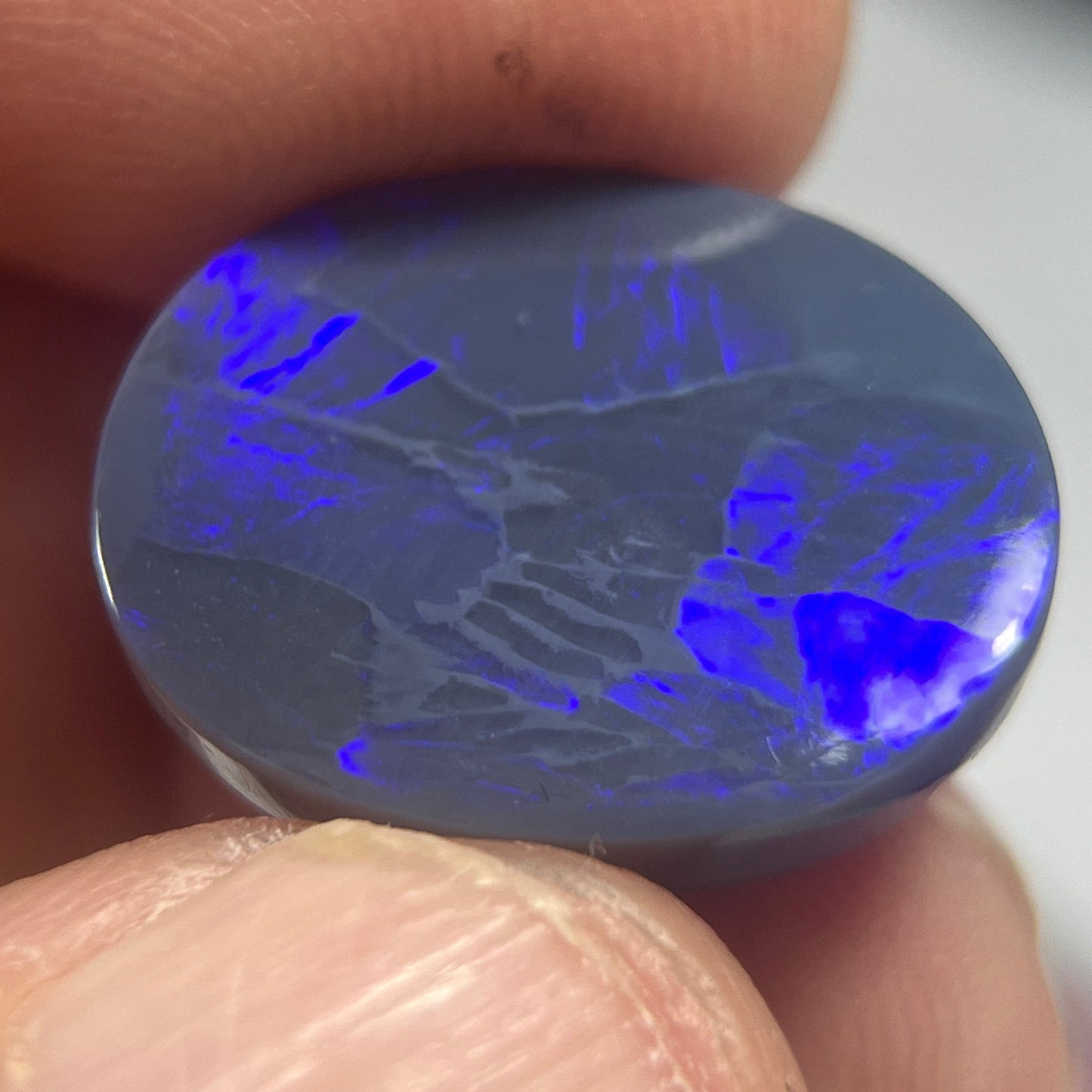 Lightning Ridge blue on black solid opal. A perfect piece with spectacular colours.