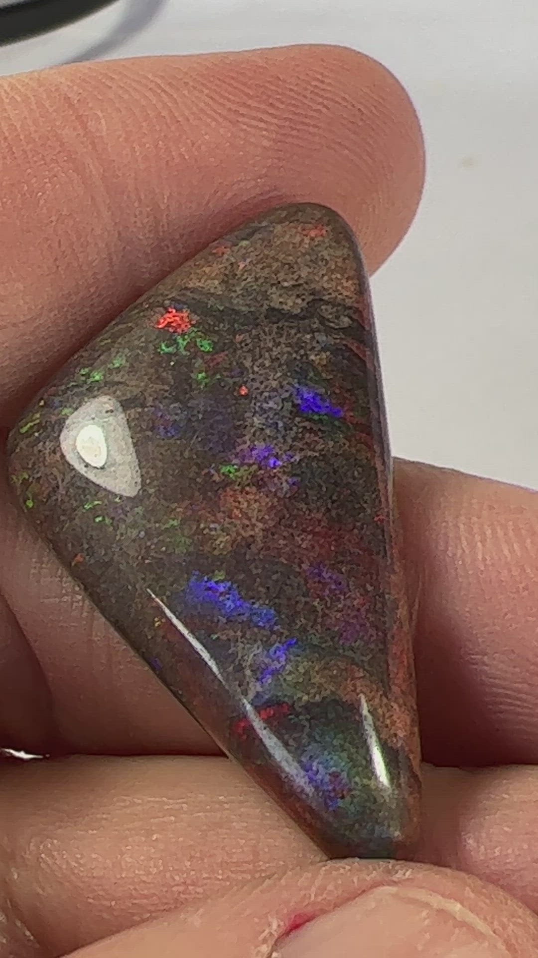 A large 30ct Andamooka Matrix opal with lovely colours and a great polish.