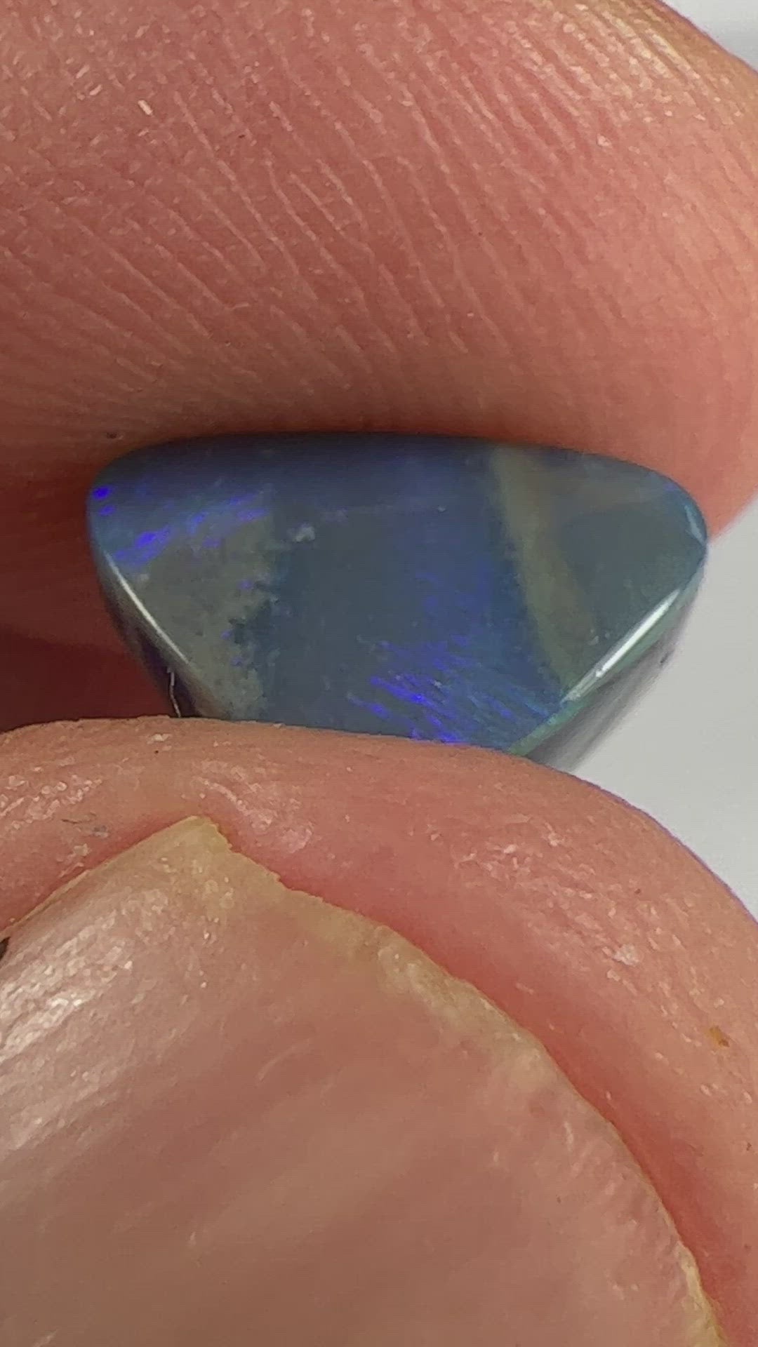 Solid blue/green Lightning Ridge opal. A nice little ring stone.