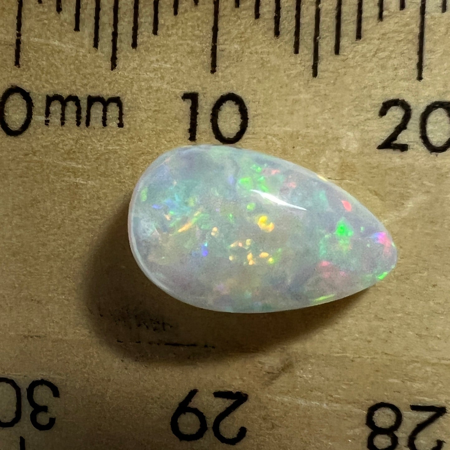 Gorgeous solid opal displaying an array of magnificent colours. Cut and polished to perfection, and ready to set.