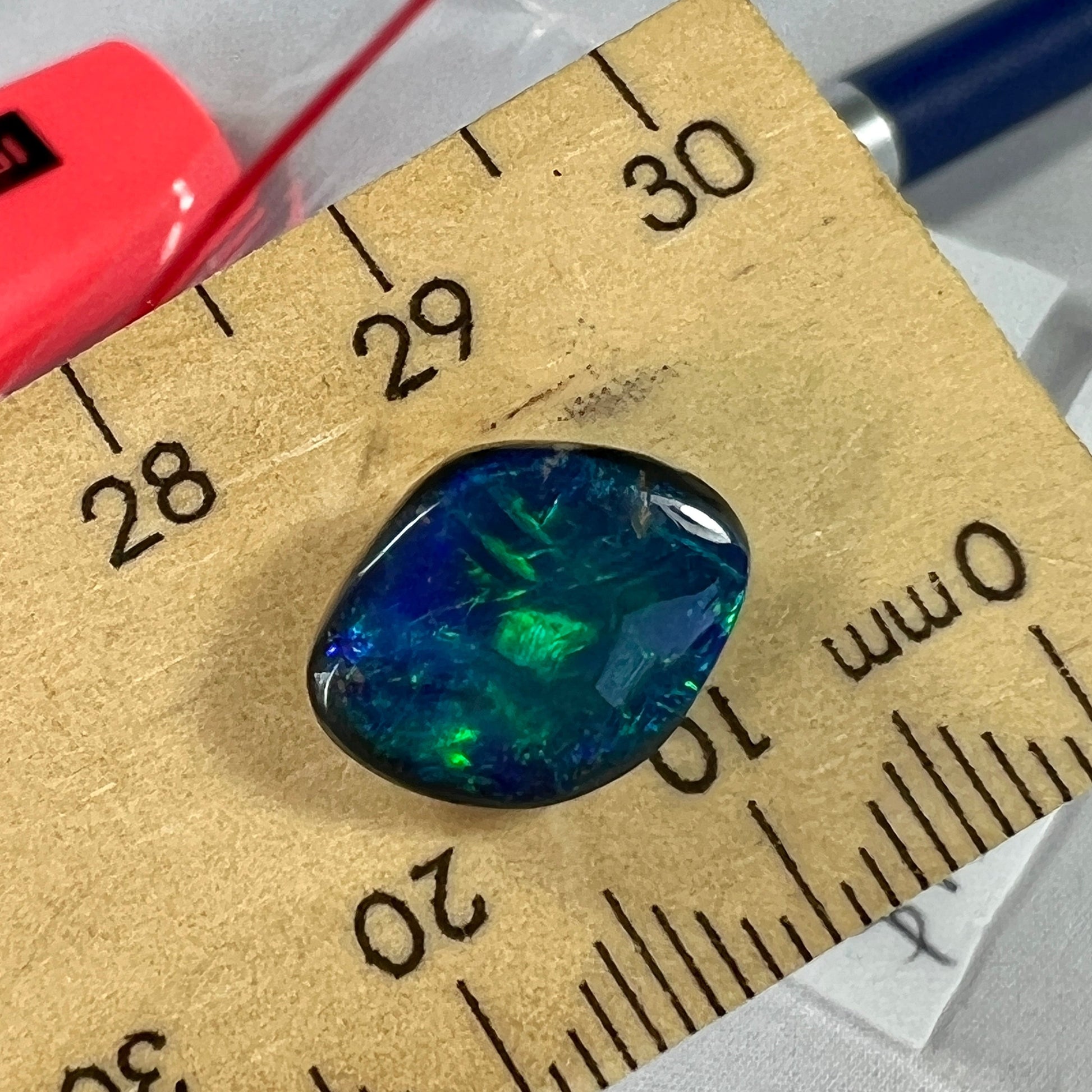 Blue black solid opal from Lightning Ridge. Beautiful patterns and colours.
