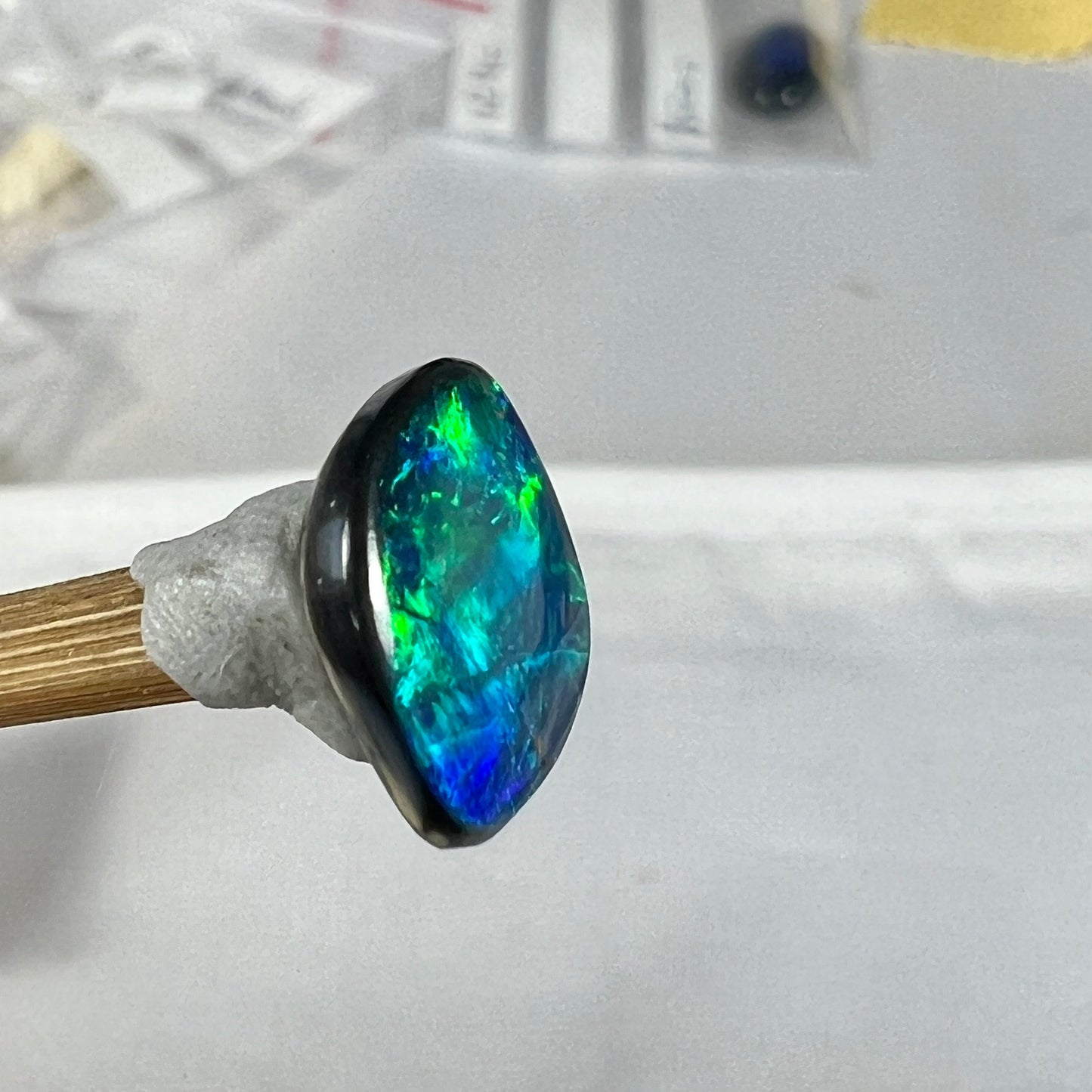 Blue black solid opal from Lightning Ridge. Beautiful patterns and colours.