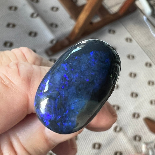 Blue black opal from Lightning Ridge, Nice shape and beautifully polished.