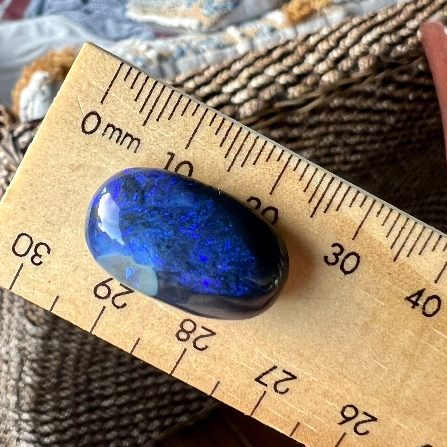 Blue black opal from Lightning Ridge, Nice shape and beautifully polished.