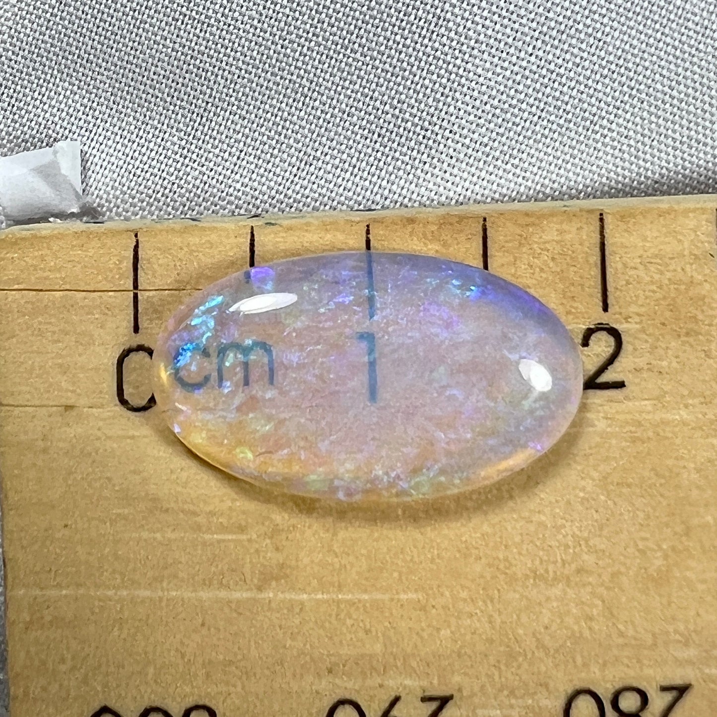 Perfectly cut Lightning Ridge crystal opal with stunning purples.