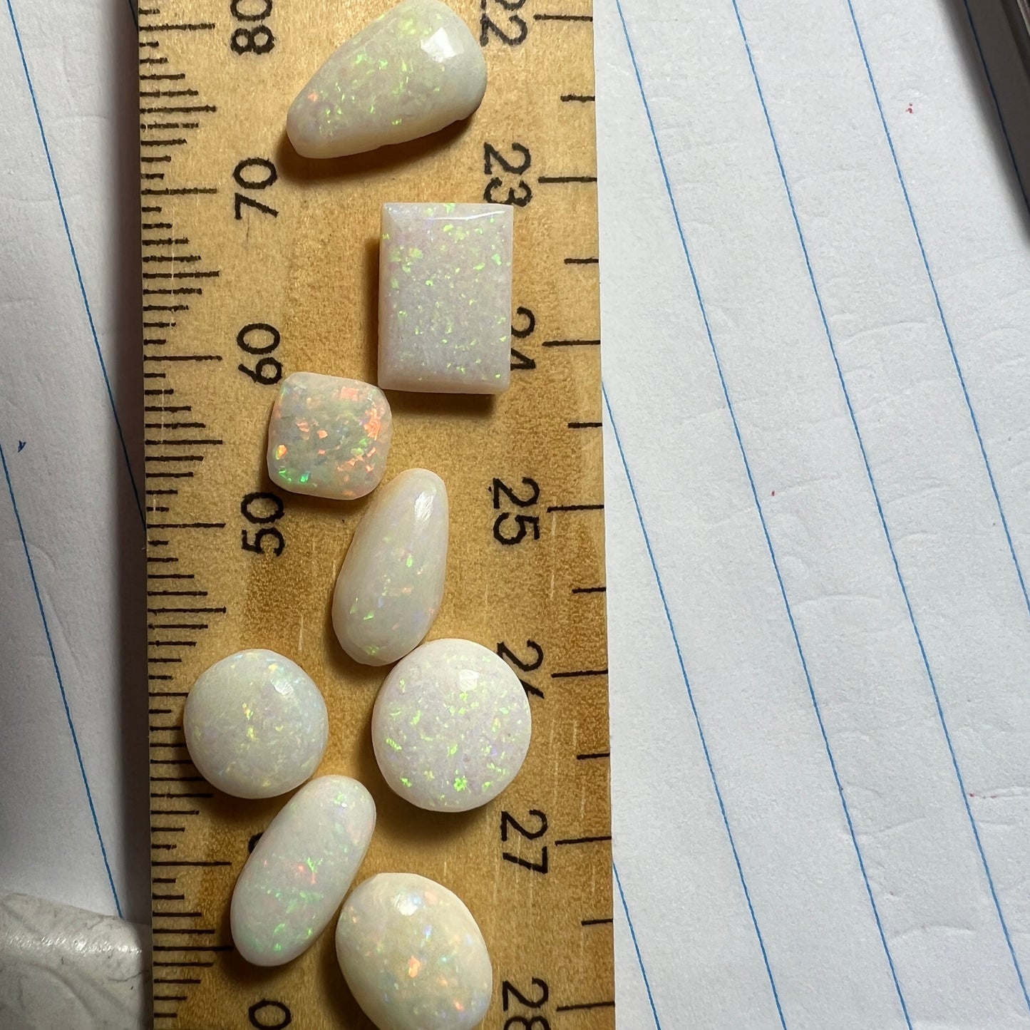 Solid white opal bundle comprising of 8 beautiful Coober Pedy ring stones in various shapes. Mainly pin fire. Ideal for jewellery makers.