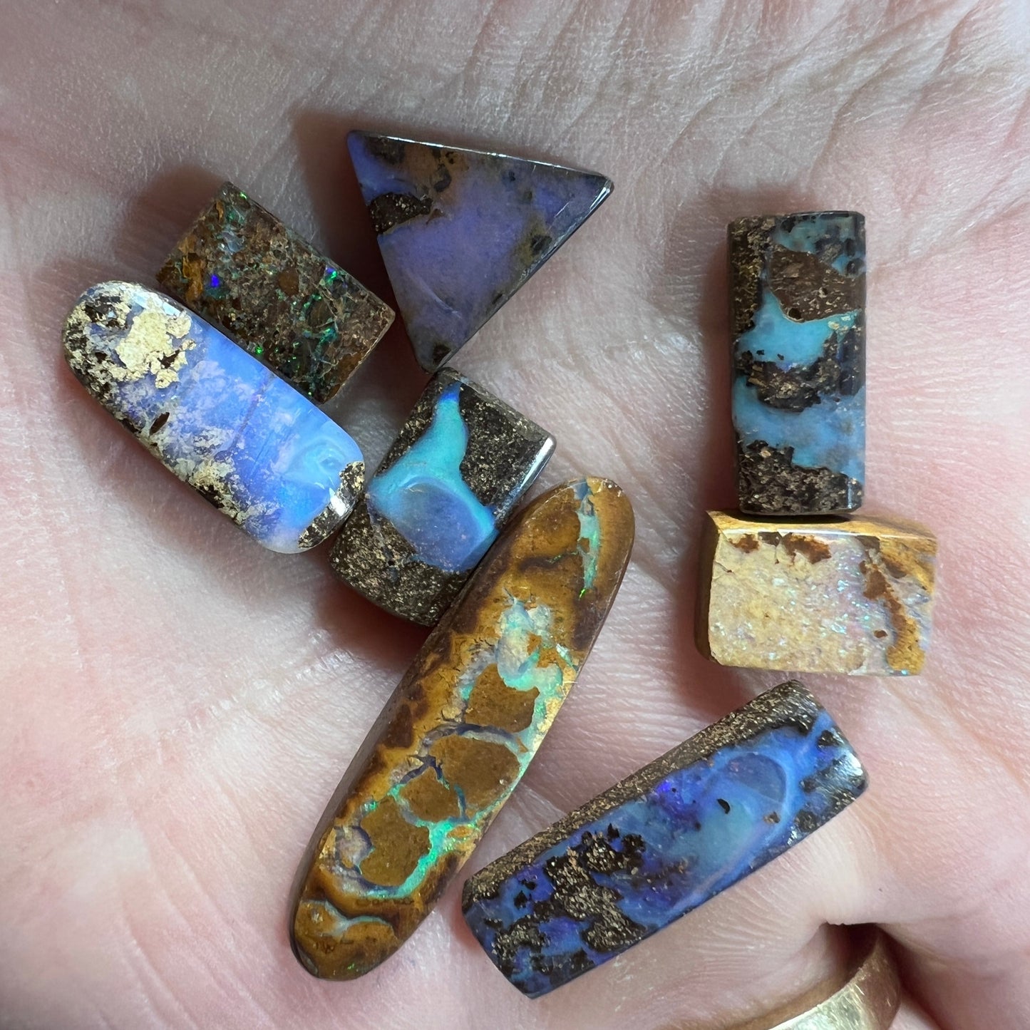 Nice group of Winton ring stones. Gorgeous colours and beautifully polished, ready to set.