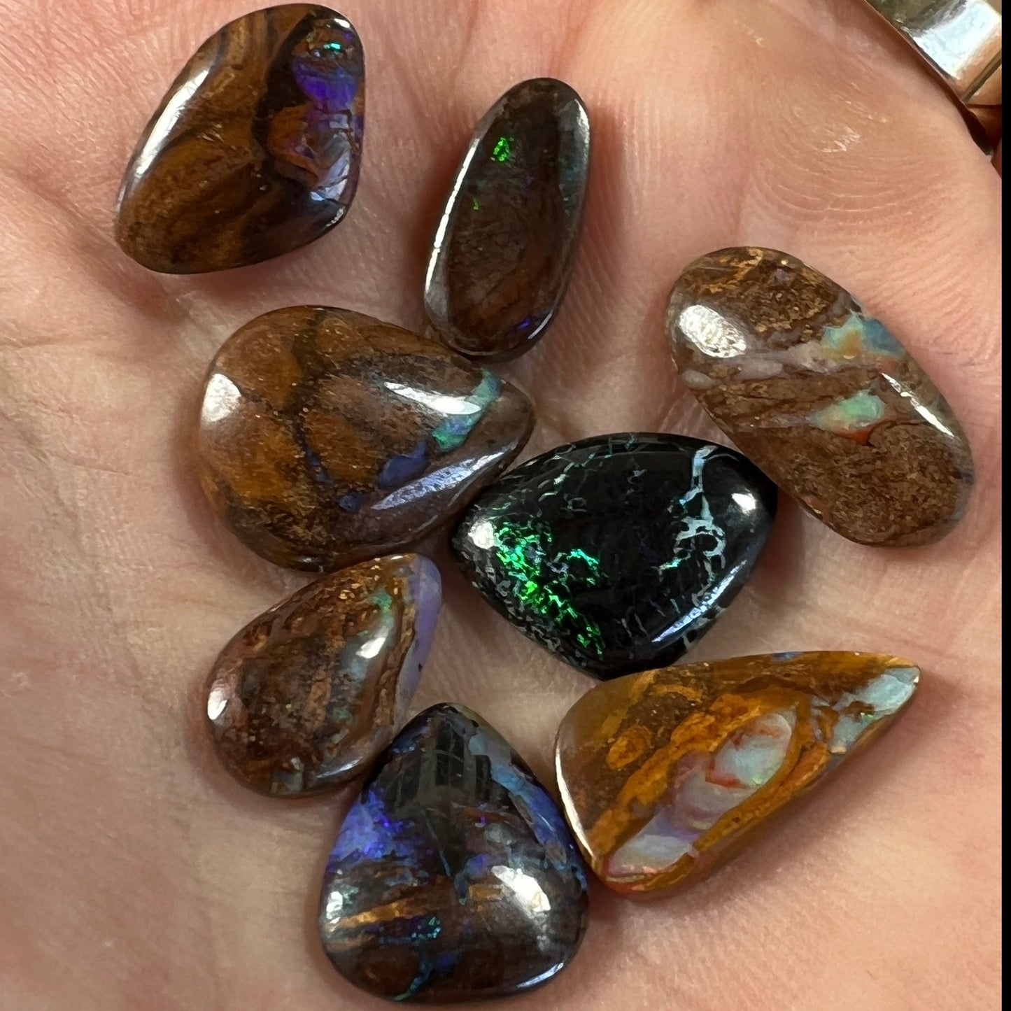 8 lovely boulder opals from Winton. Nice polish and colours.