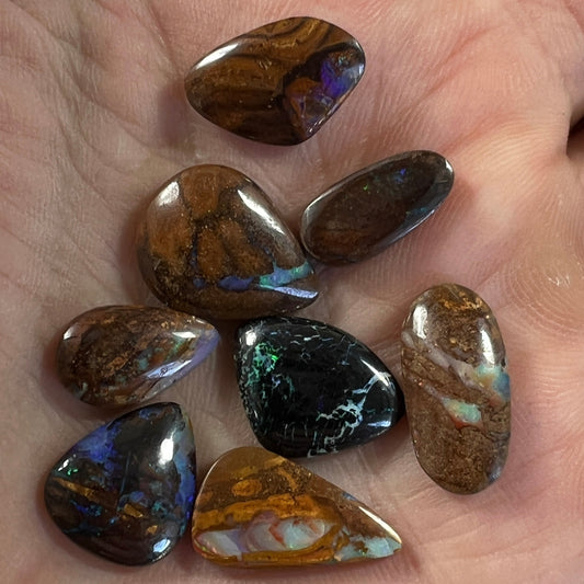 8 lovely boulder opals from Winton. Nice polish and colours.