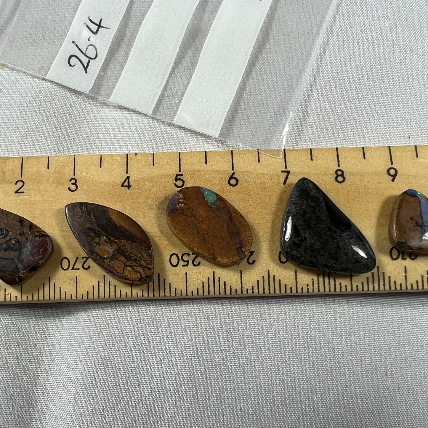 4 x Winton opals and 1 x Andamooka Matrix opal. Beautiful specimens showing lovely colours. Polished and ready to set.