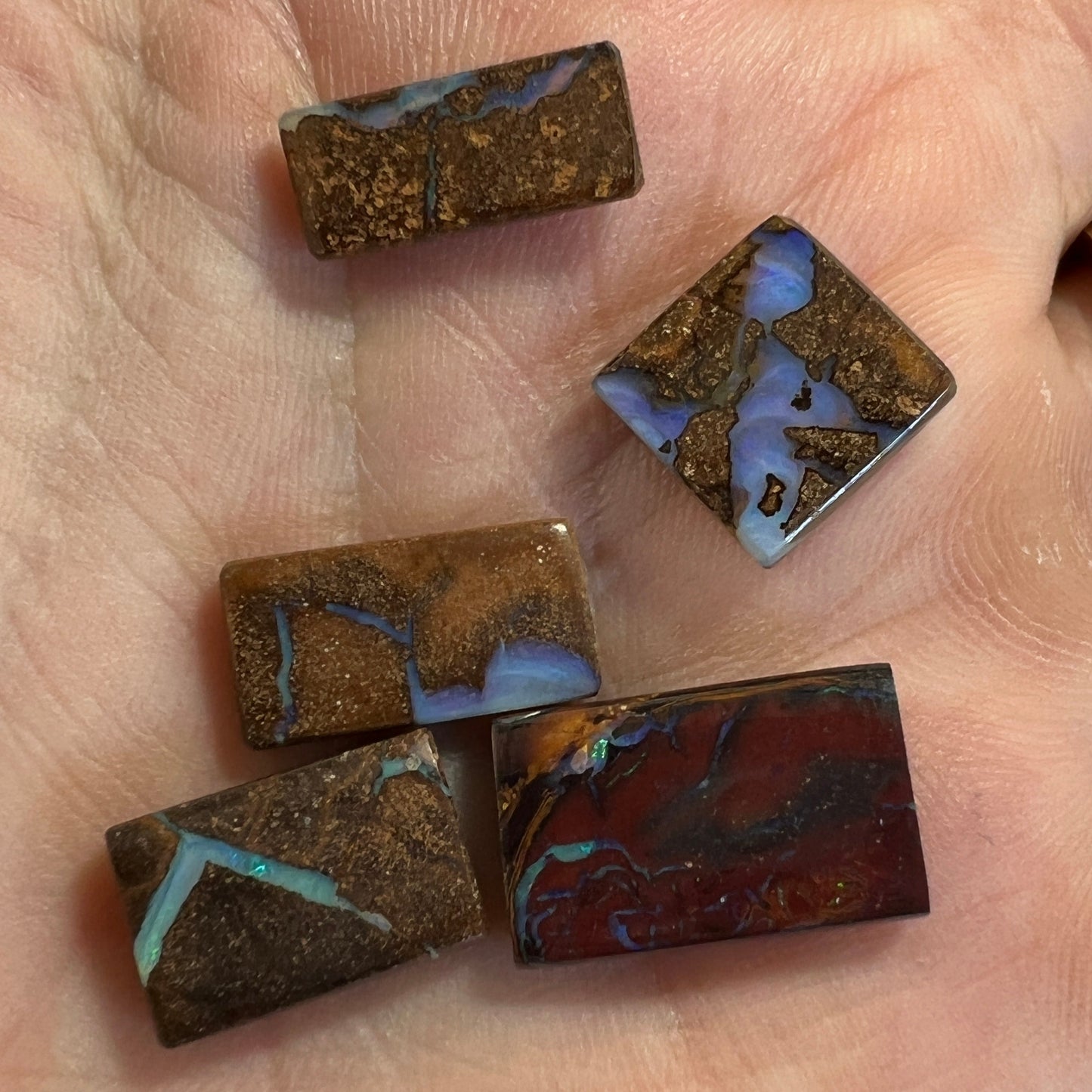Five square cut boulder opals from Winton. Nice polish.
