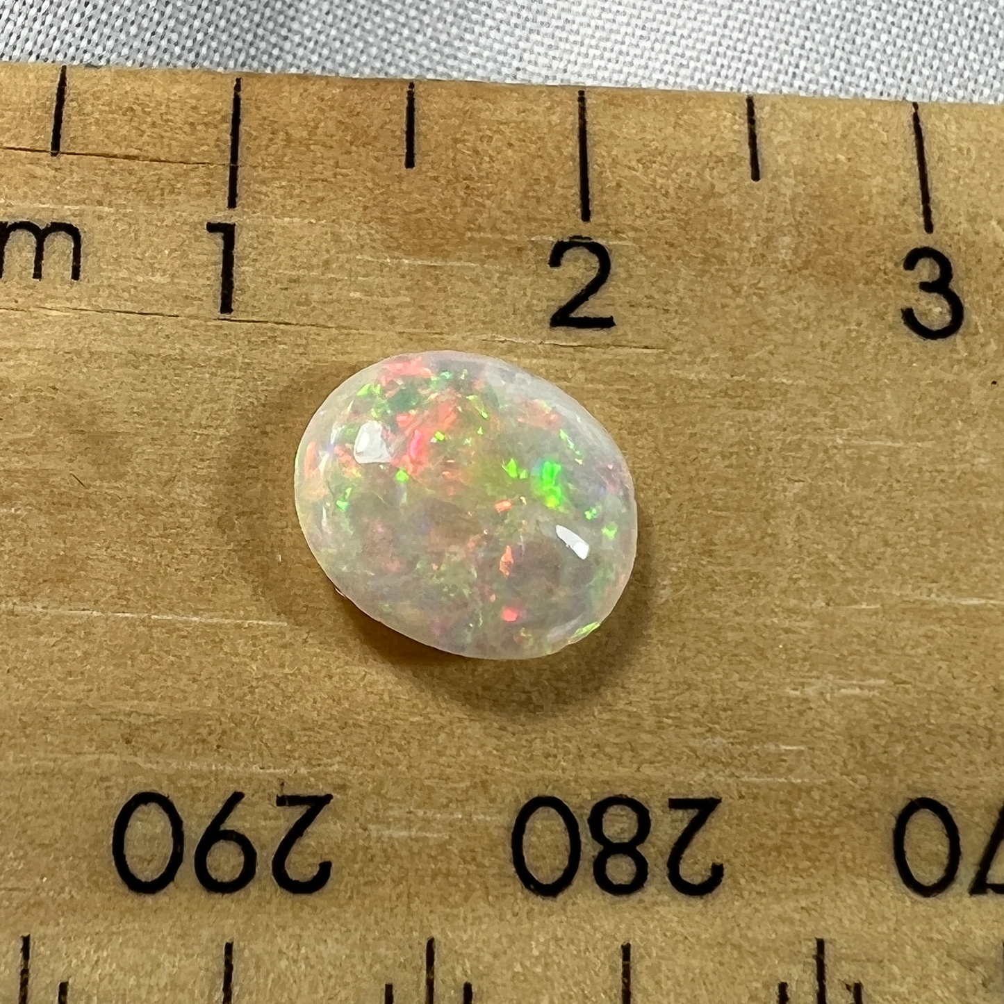 Double sided crystal opal with a perfect finish. An excellent solid opal with awesome colours.