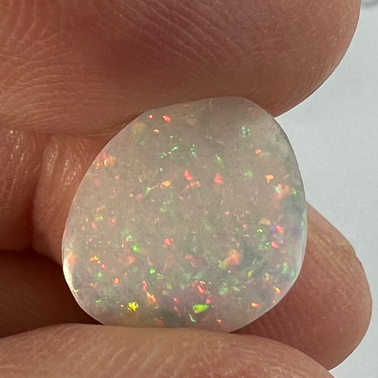 This Coober Pedy pin fire has the most amazing colours (very hard to capture). Perfectly polished by Bill Johnson.