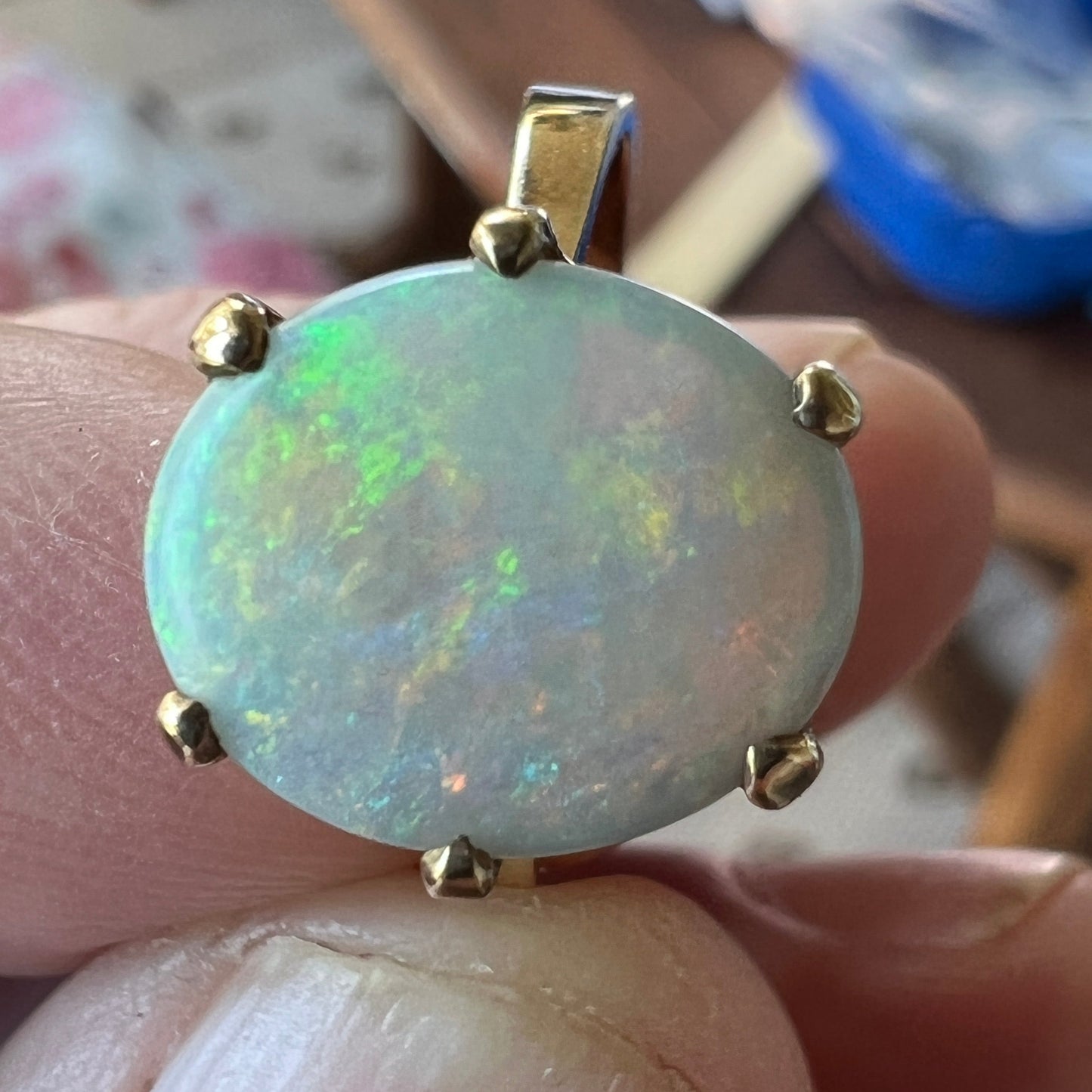 Wonderful cut, set and polish on this beautiful Coober Pedy opal. Set in 14ct gold.