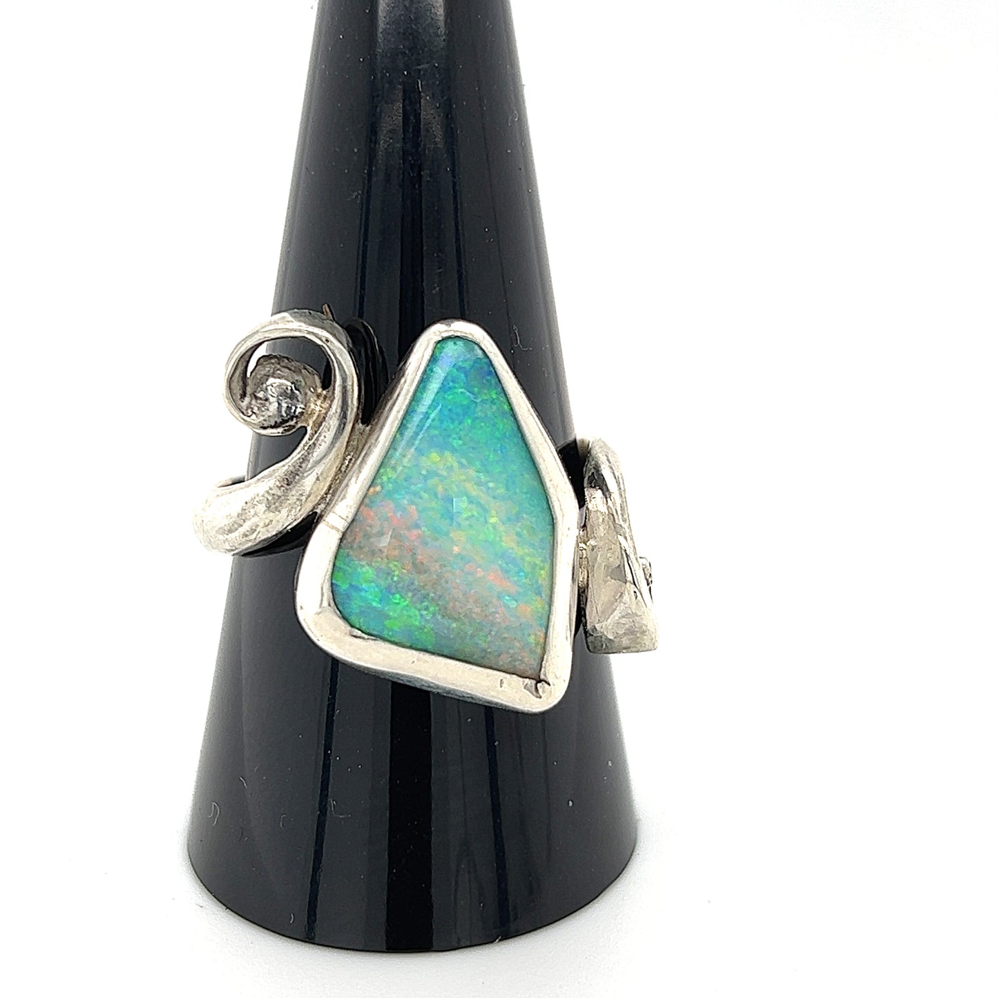 Queensland boulder opal ring set in Argentium silver, hand crafted by our Queensland silversmith. Stunning colours in this unique one-of-a-kind ring.