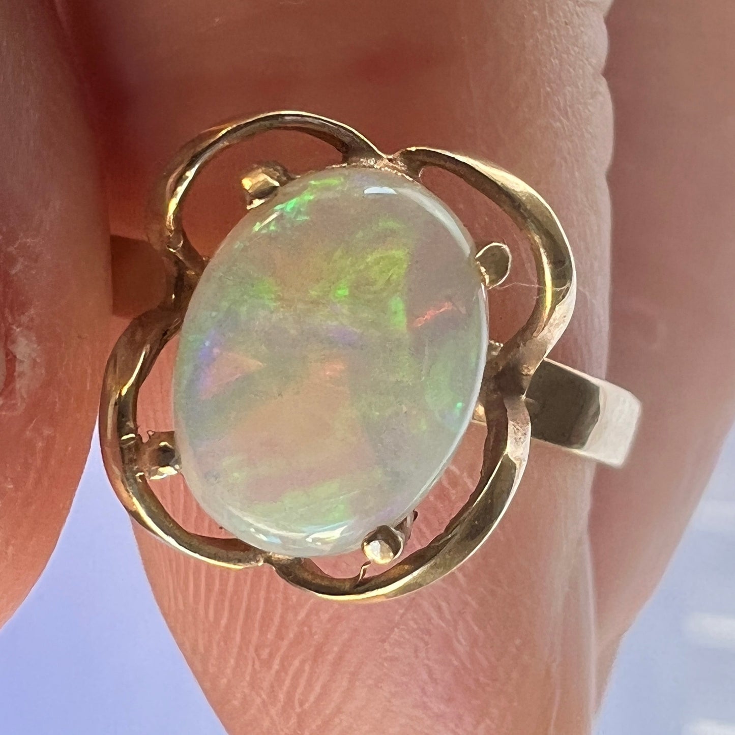 Very pretty one-off ring. Beautiful setting with an immaculate Coober Pedy crystal opal showing magnificent colours.