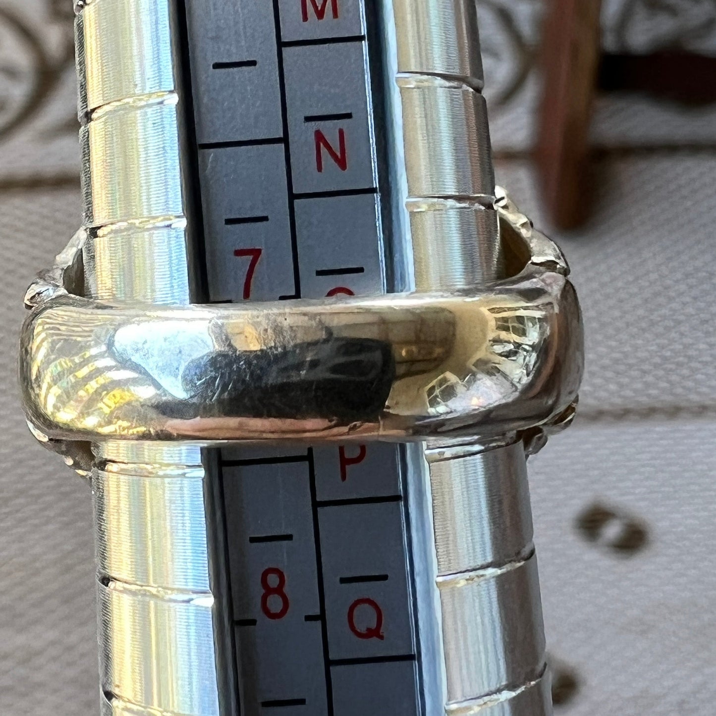 Magnificent handmade silver ring featuring a beautiful cushion cut 10ct Coober Pedy opal, displaying a wonderful full array of pinfire colours. One of a kind.
