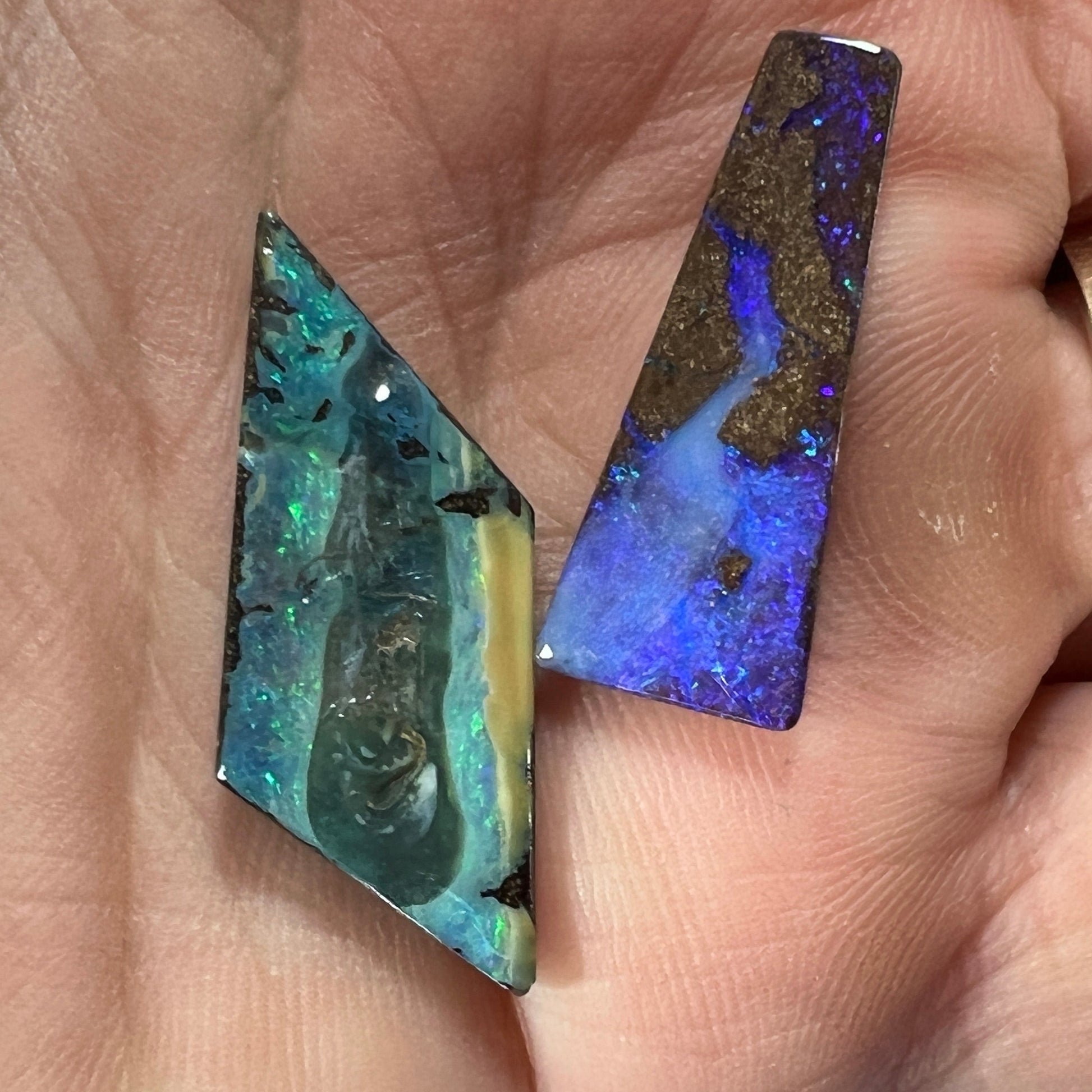 Two gorgeous pieces of boulder opal from Winton. Great colours. Polished and ready for setting.