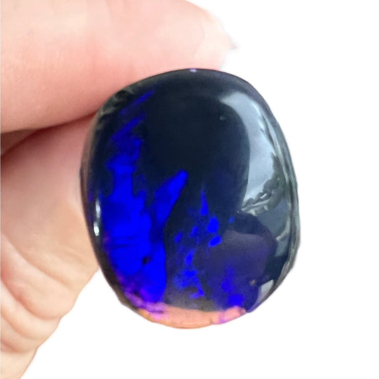 Nice Lightning Ridge Blue on Black Opal. Nice dome and polish. Clear on one end. Can be cut down or left as is, hence discounted price.
