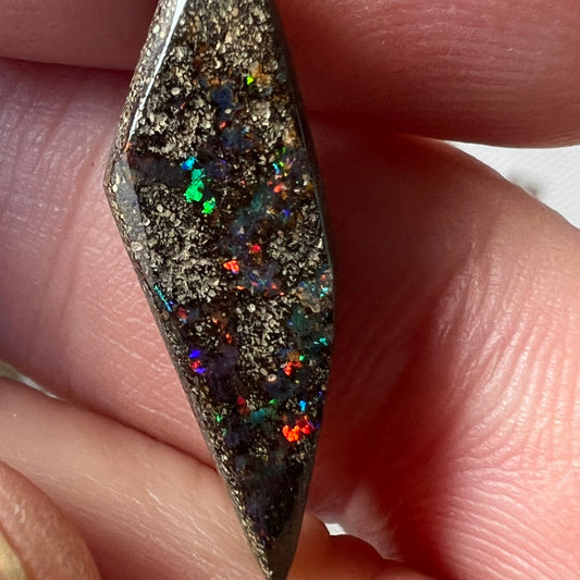 Great piece of Winton boulder opal showing nice colours including reds.