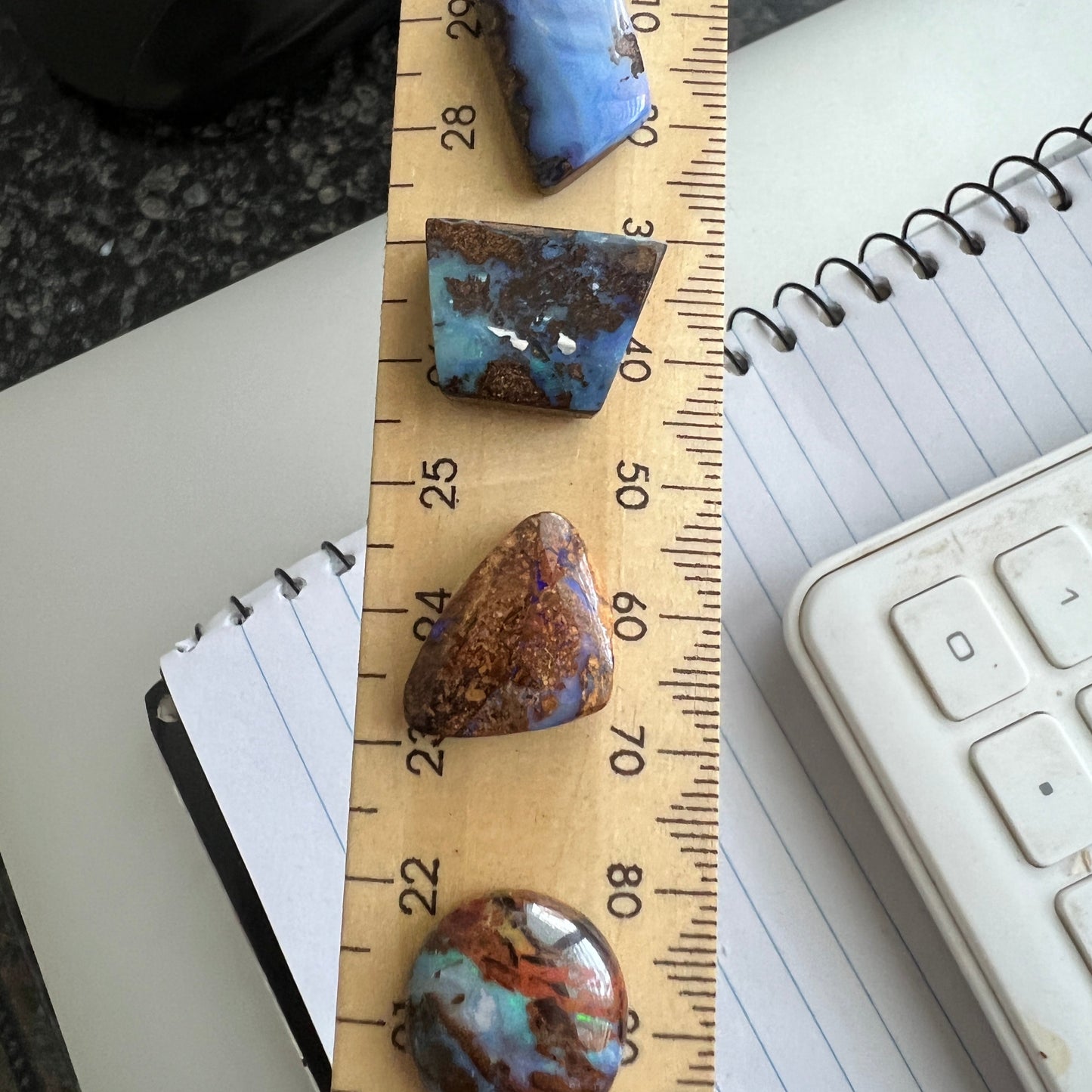 Bundle of four awesome boulder opals from Winton. Polished and ready to set.