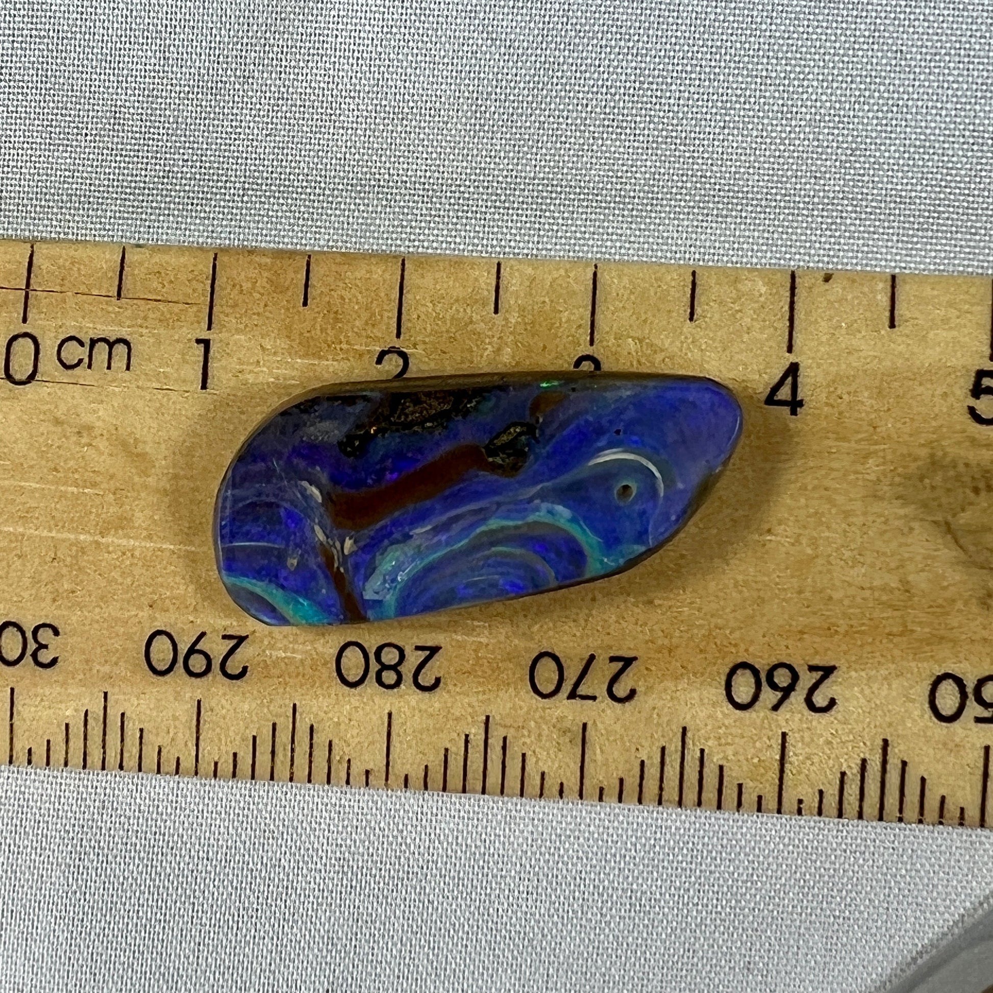 Bright and bold colours and awesome patterns in this beautiful piece of boulder opal from Winton. Nicely polished and a perfect pendant.