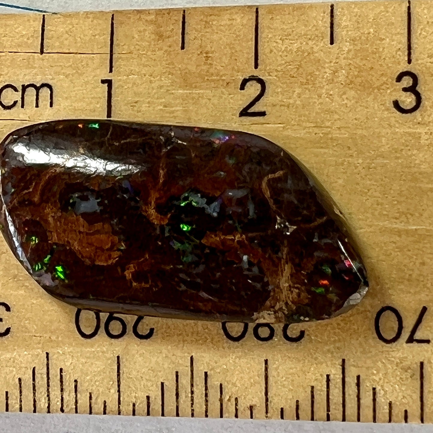 Boulder opal from Opalton, with a fantastic cut and polish, displaying great colours.