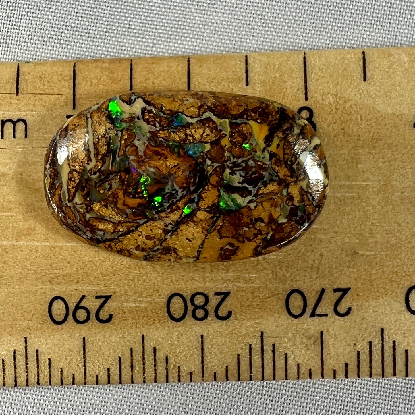 A great Opalton 'nut'. Unique colours for a wonderful piece of jewellery or simply as a keeper.