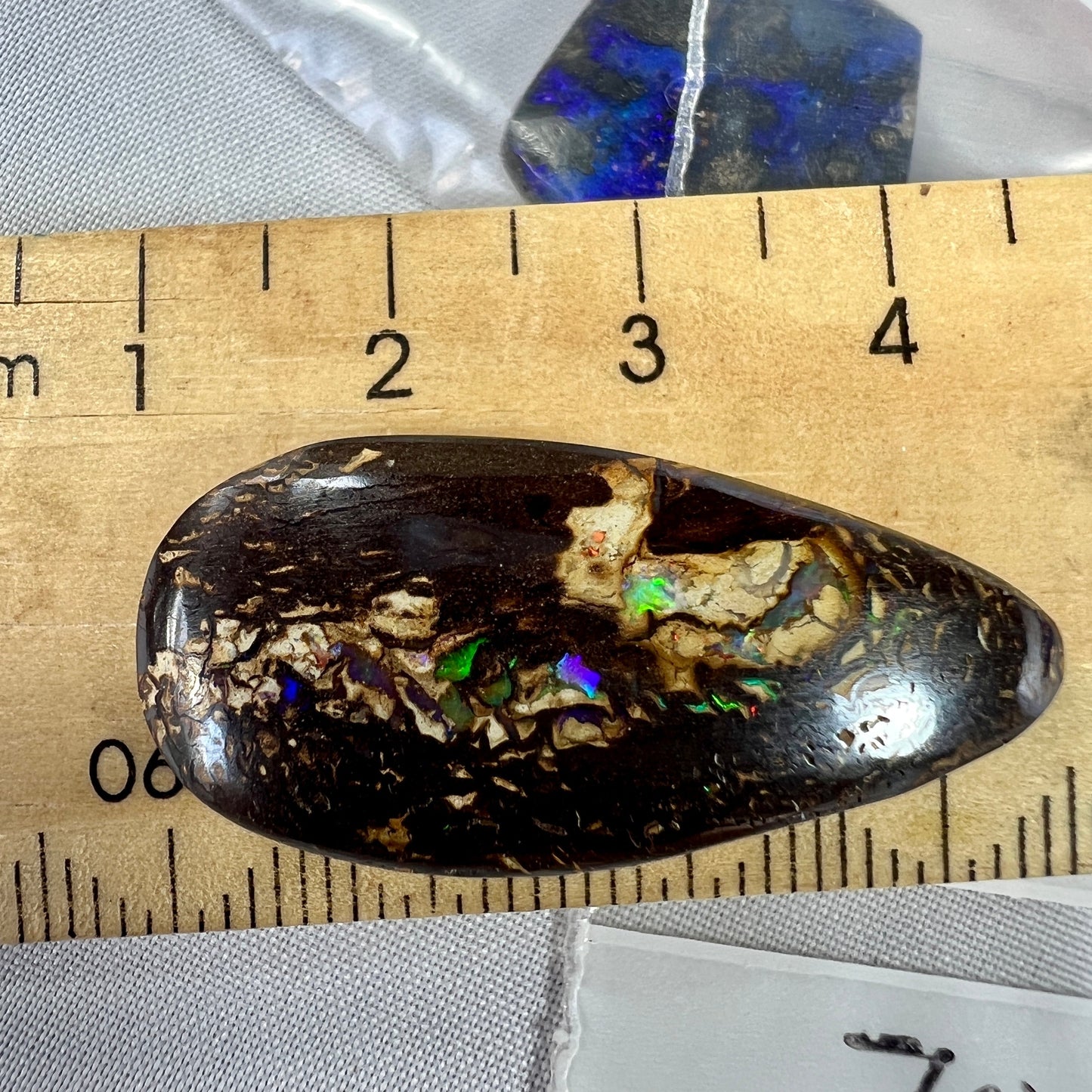 Great shaped boulder opal from Opalton, Queensland, with flashing colours.