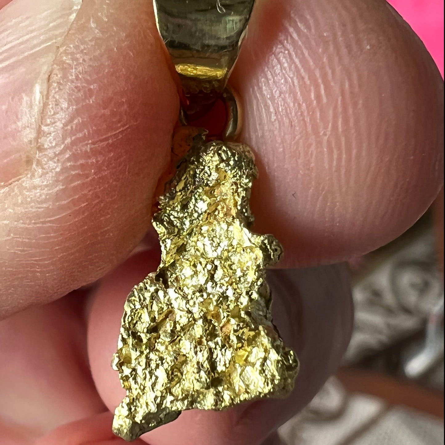 Pure solid gold nugget pendant from Western Australia. Perfectly set with a 18ct gold bale. Set beautifully with a solid black opal from Lightning Ridge.