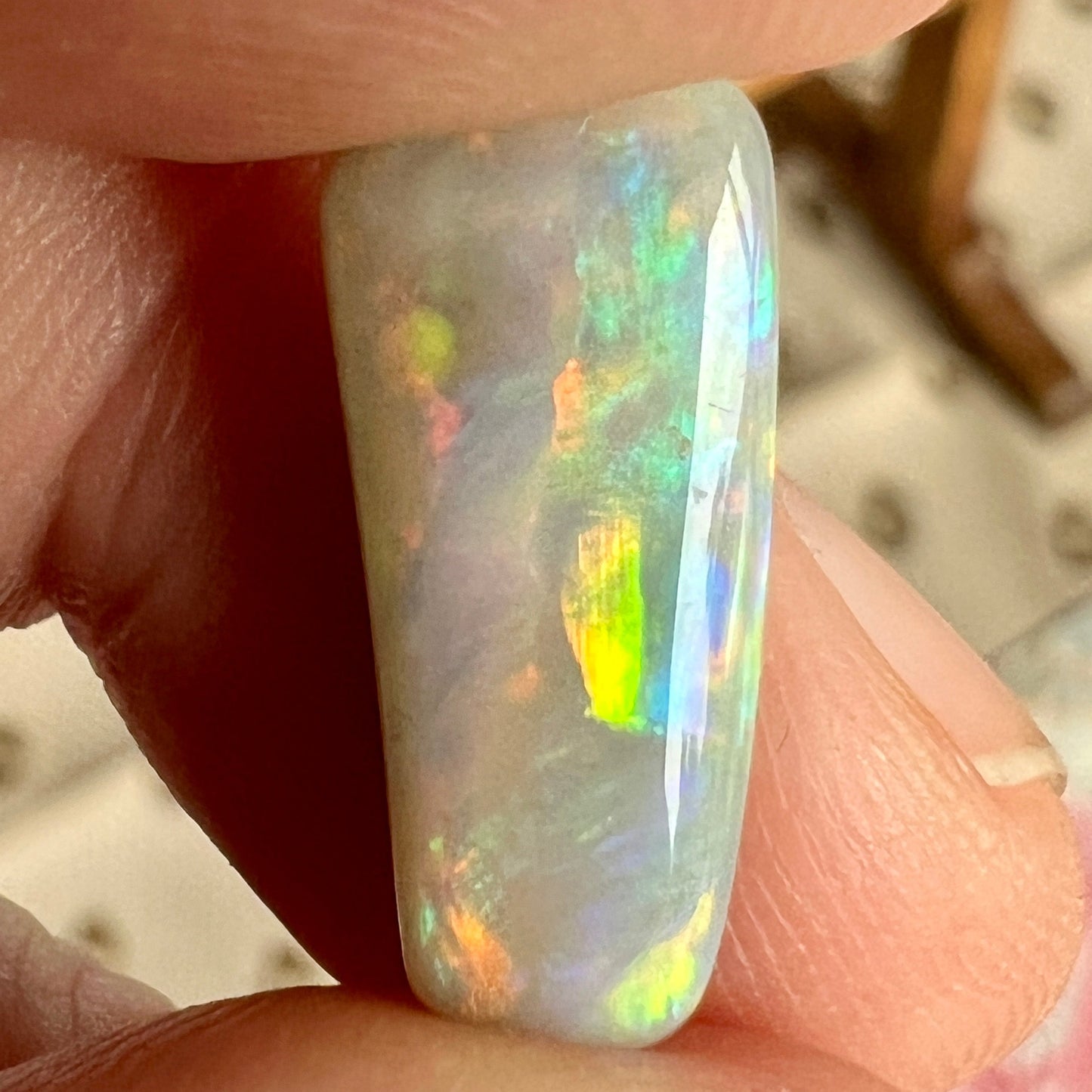 Absolutely stunning piece of rare Mintabie opal, displaying fiery colours from every angle.