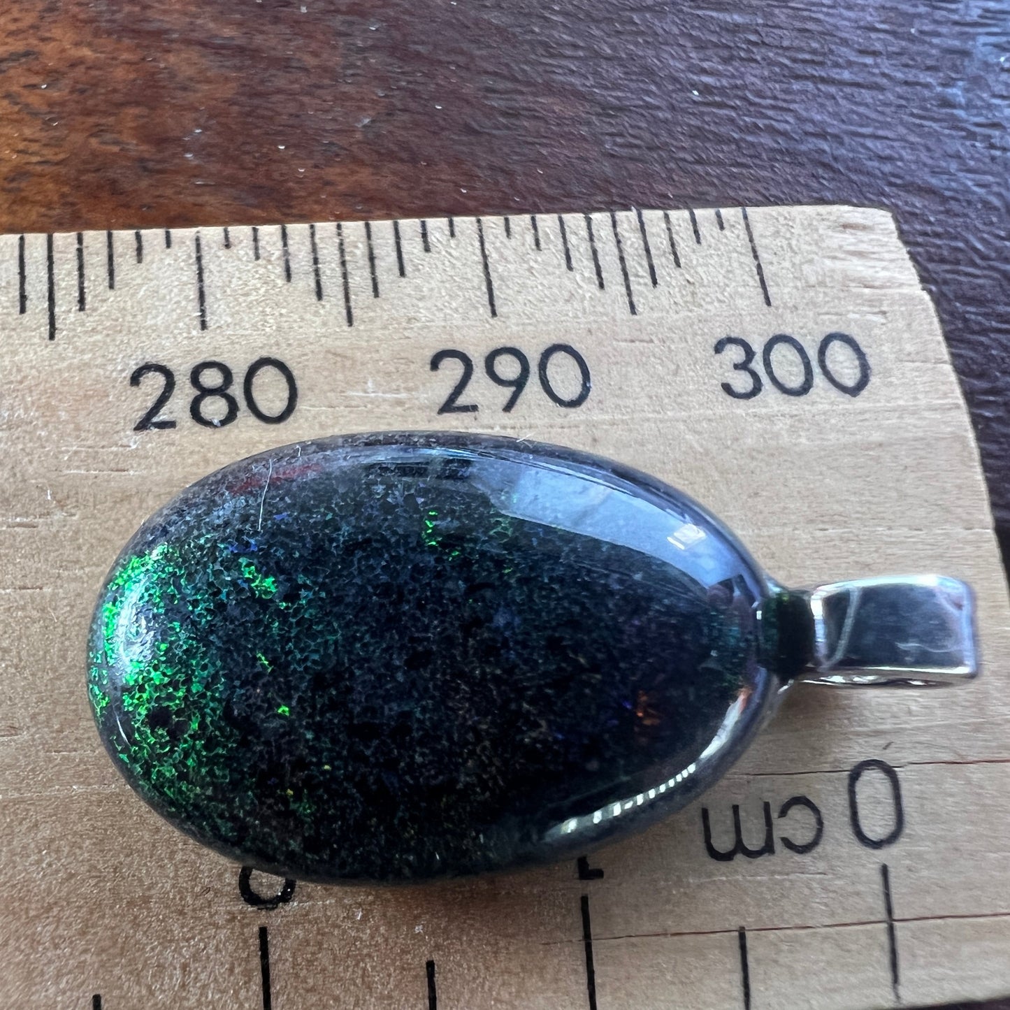 Andamooka Matrix opal pendant featuring a lovely display of colours. Ready to wear.