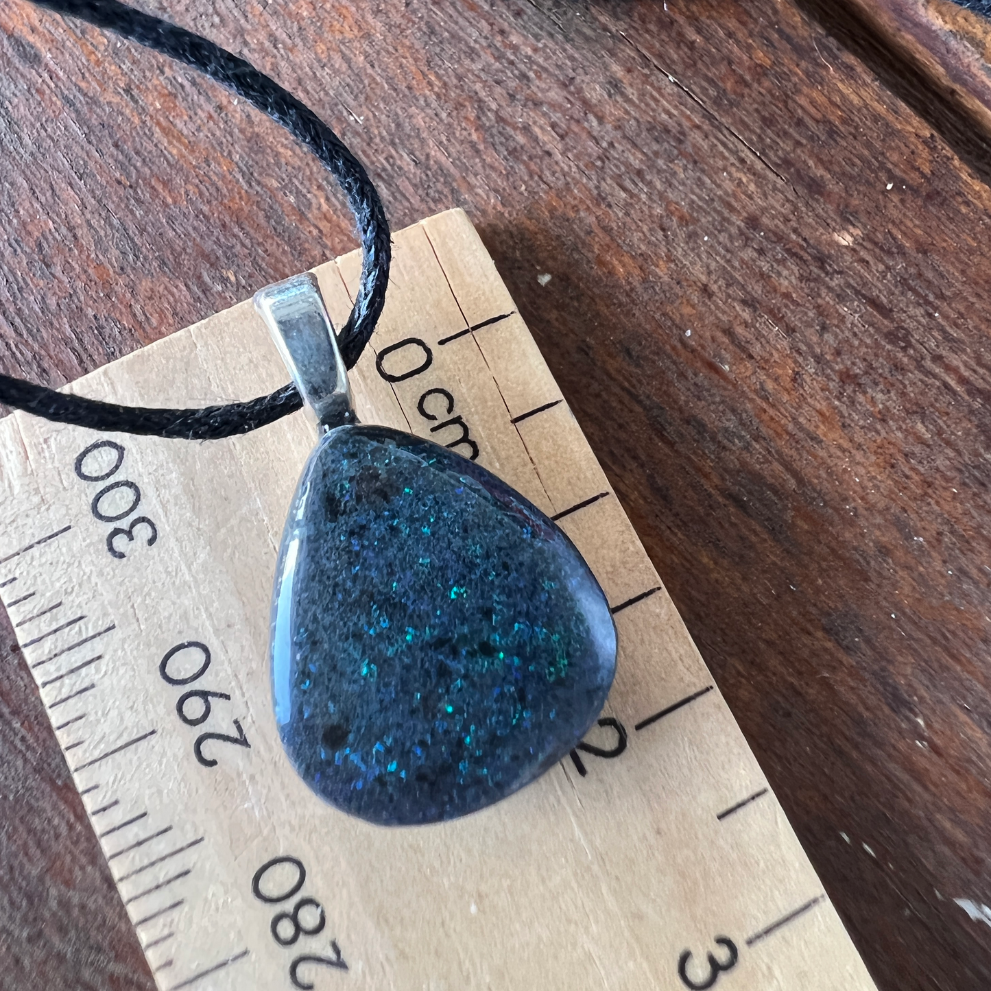 Andamooka Matrix opal pendant with a lovely display of colours.