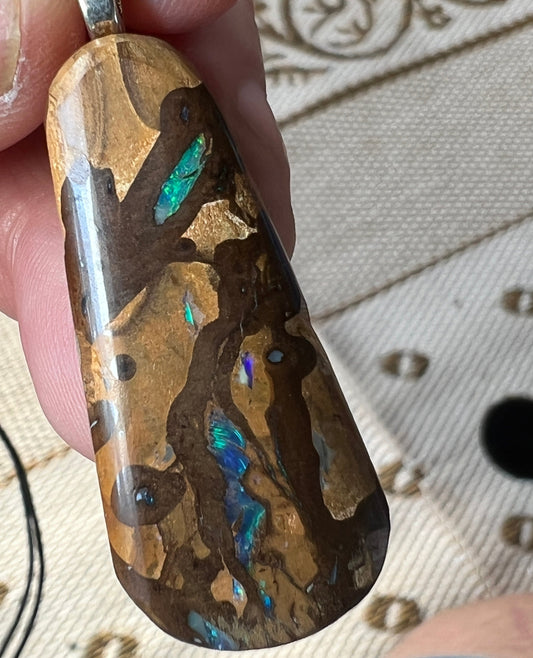 Beautiful piece of Winton Boulder opal. Ready to wear.
