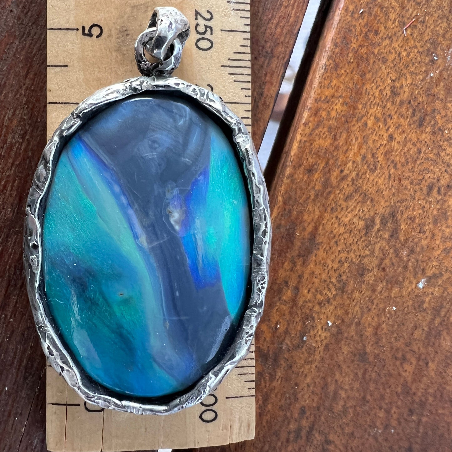 Awesome Lightning Ridge picture stone opal. Mounted with Argentium silver which complements the stone beautifully. Another Sally Fisher designer masterpiece.