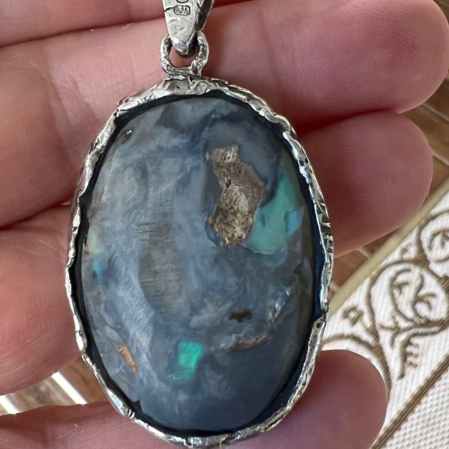 Awesome Lightning Ridge picture stone opal. Mounted with Argentium silver which complements the stone beautifully. Another Sally Fisher designer masterpiece.