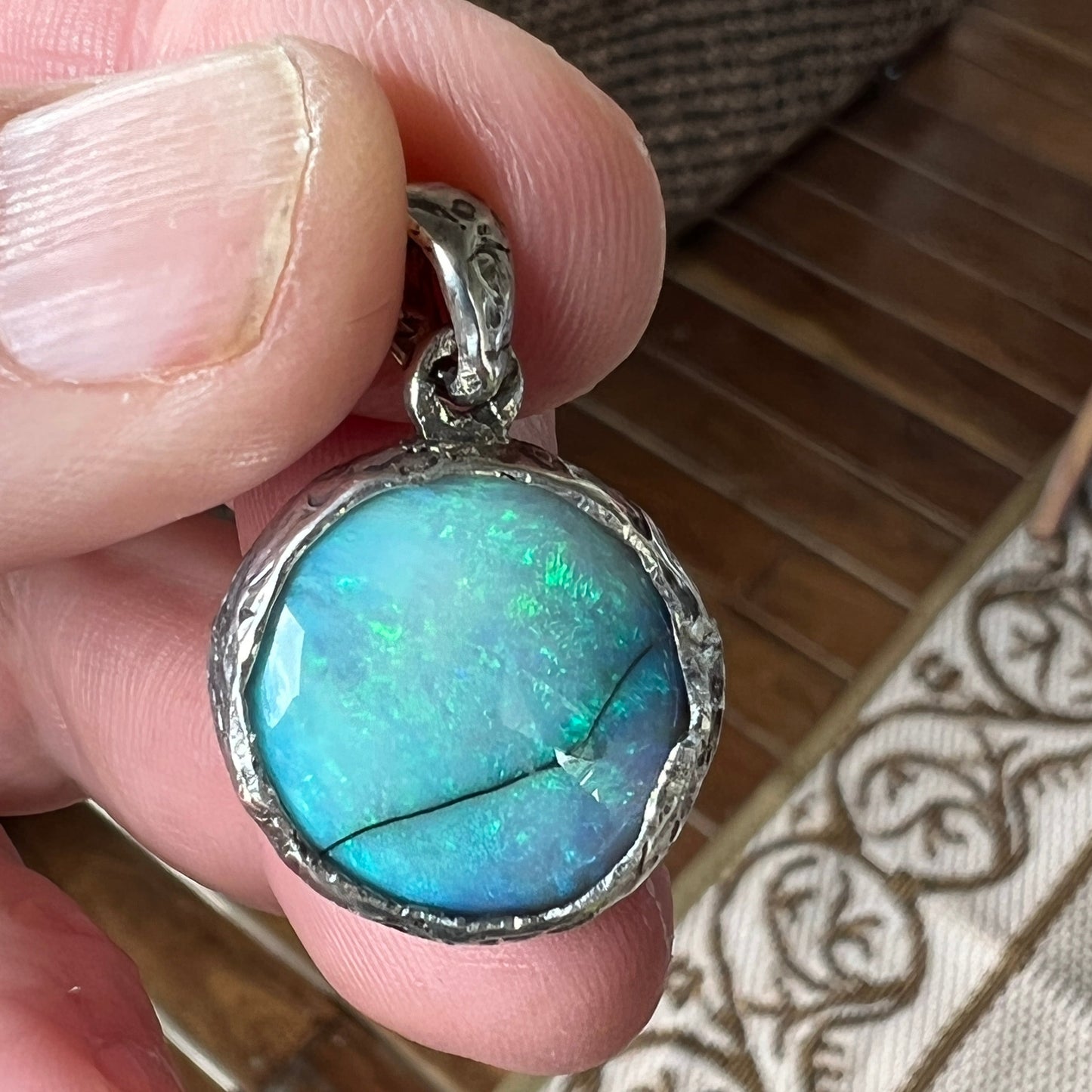 Awesome Lightning Ridge picture stone opal. Mounted with Argentium silver which shows off the stone perfectly. A beautiful design by Sally Fisher.