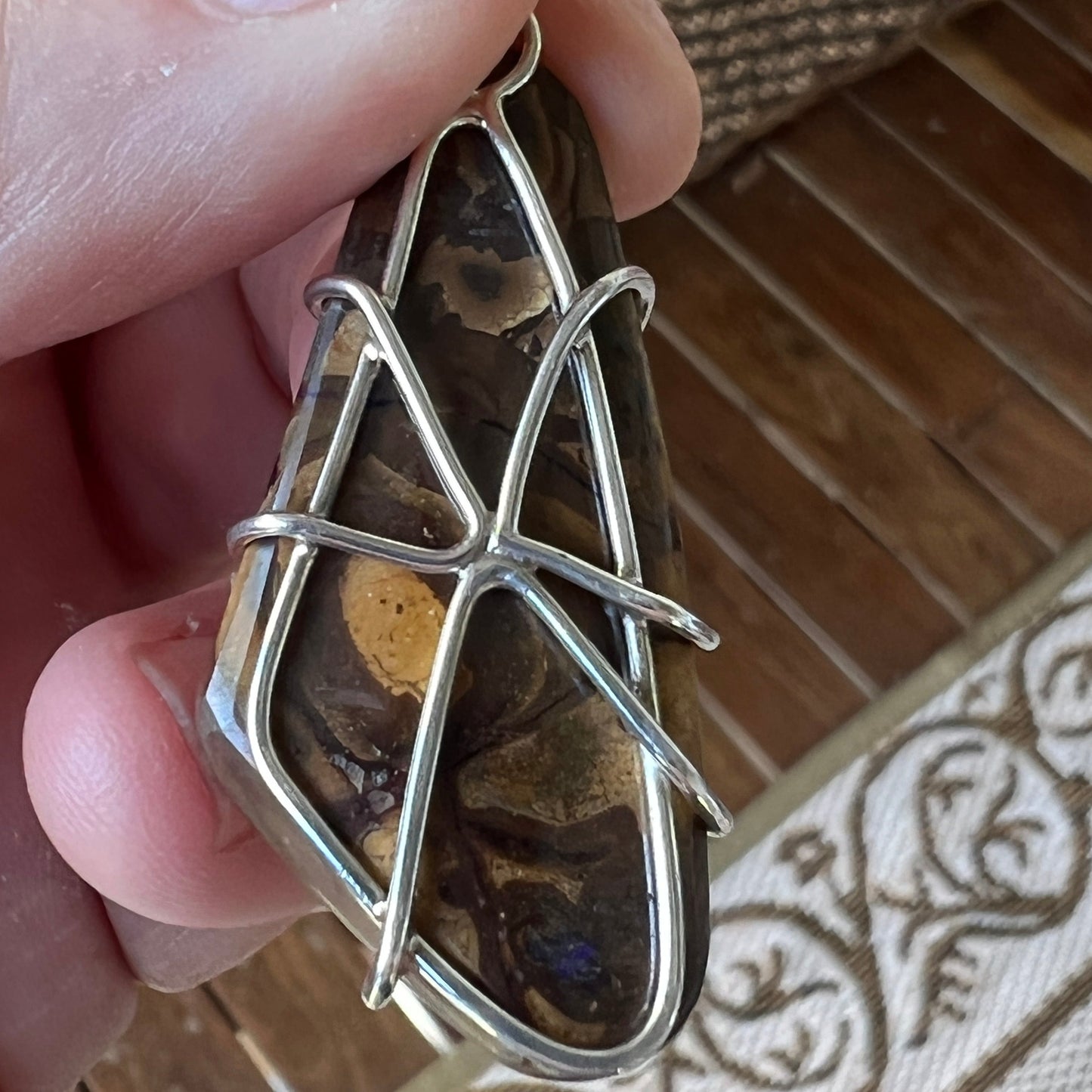 A wonderful example of Winton Boulder opal. Great shape and colours. Mounted on custom made silver. A lovely piece.
