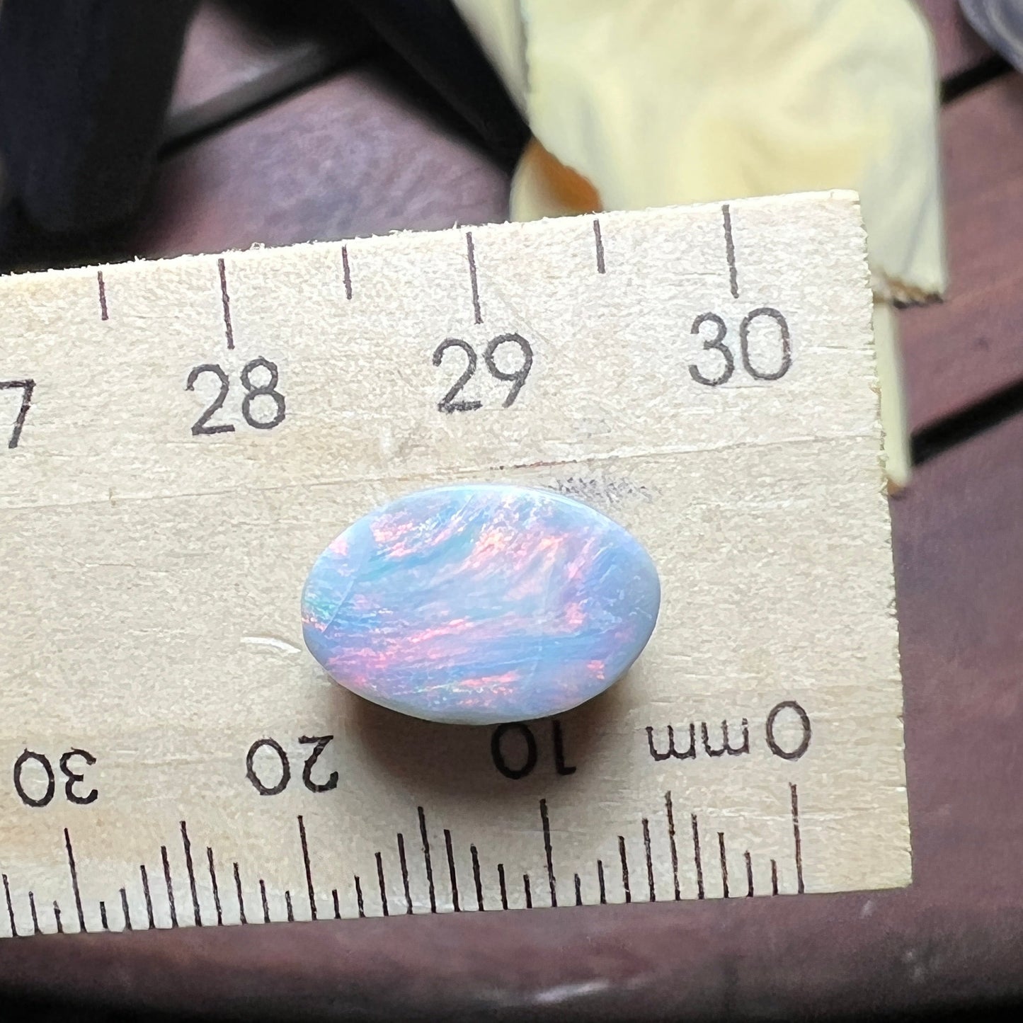 Lightning Ridge solid semi black opal with fantastic pattern and colours. Shaped to perfection.