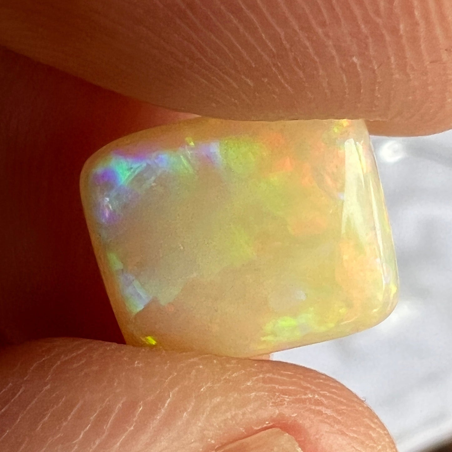 Beautiful Lightning Ridge cushion cut stone. Top polished wonderfully. Full of colour.