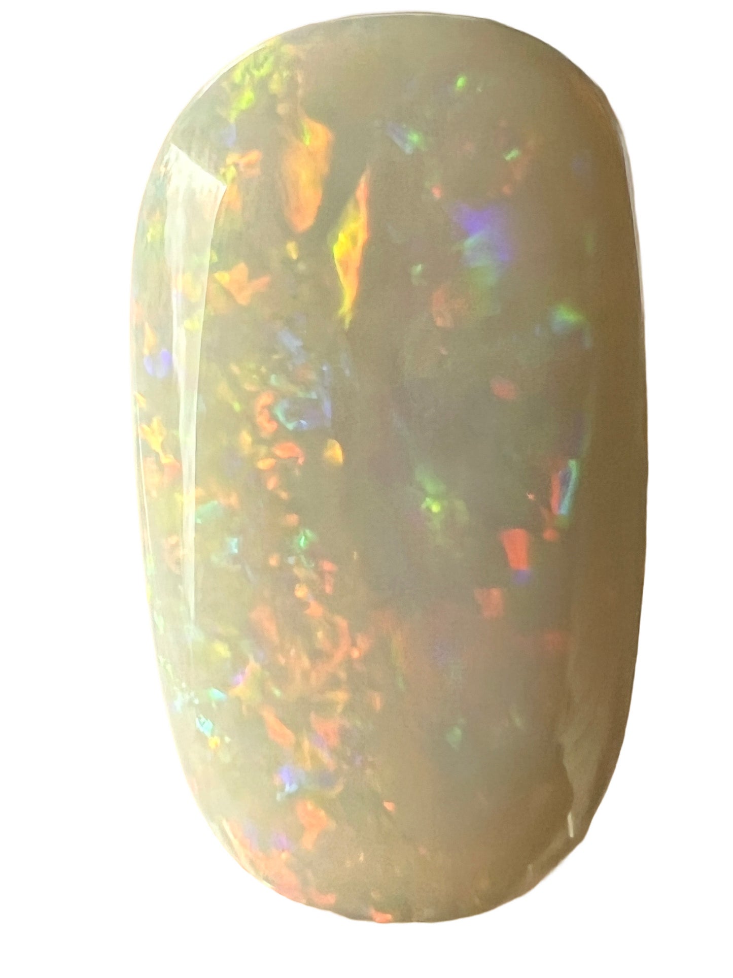 Beautiful array of colour in this solid white opal from Coober Pedy. A nice cut and ready to set.