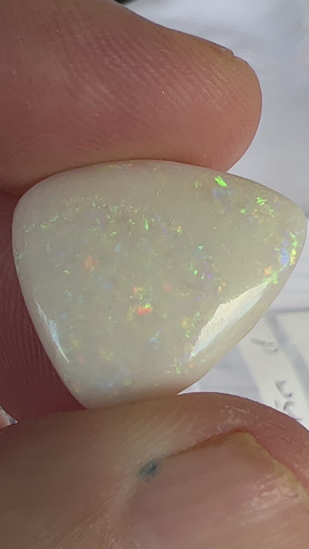 Coober Pedy solid white opal with Pin Fire colours. Quite large, and polished well, ready to make a pendant.