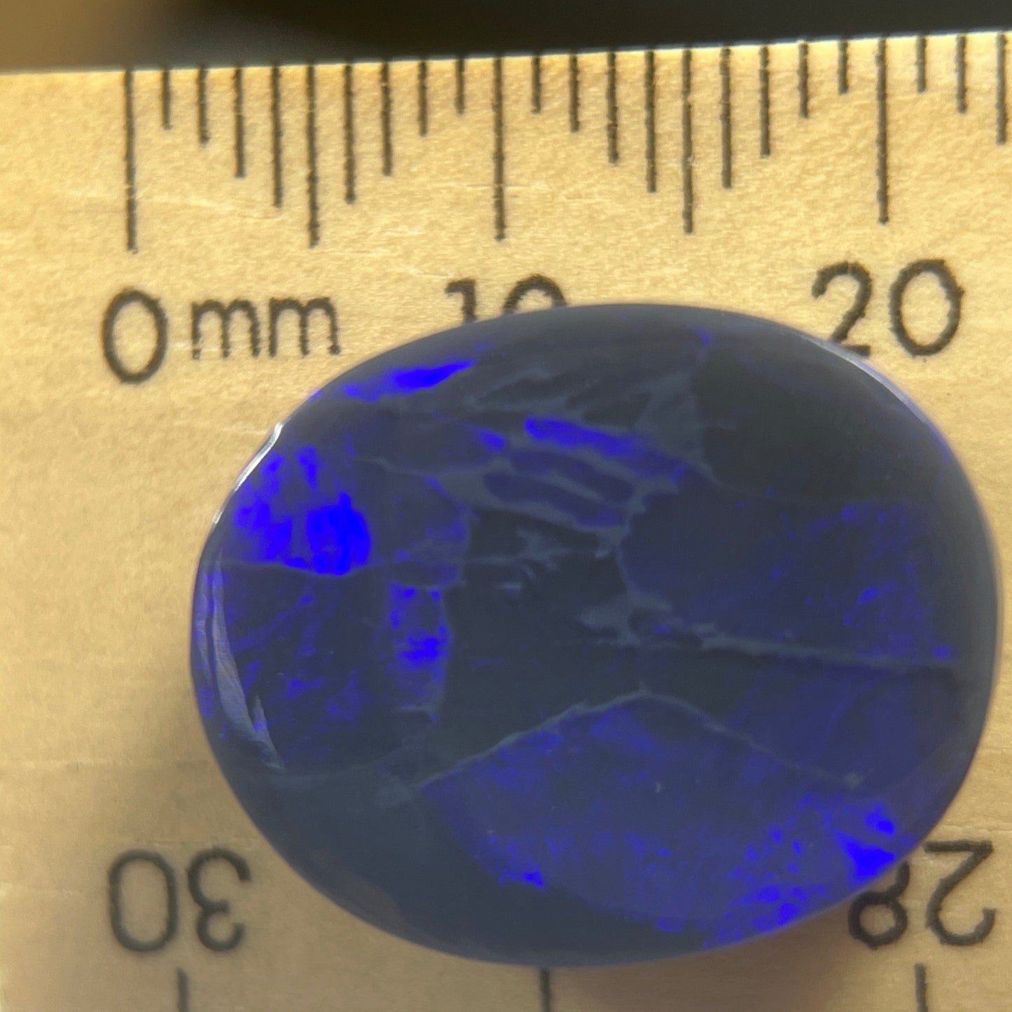 Lightning Ridge blue on black solid opal. A perfect piece with spectacular colours. 
