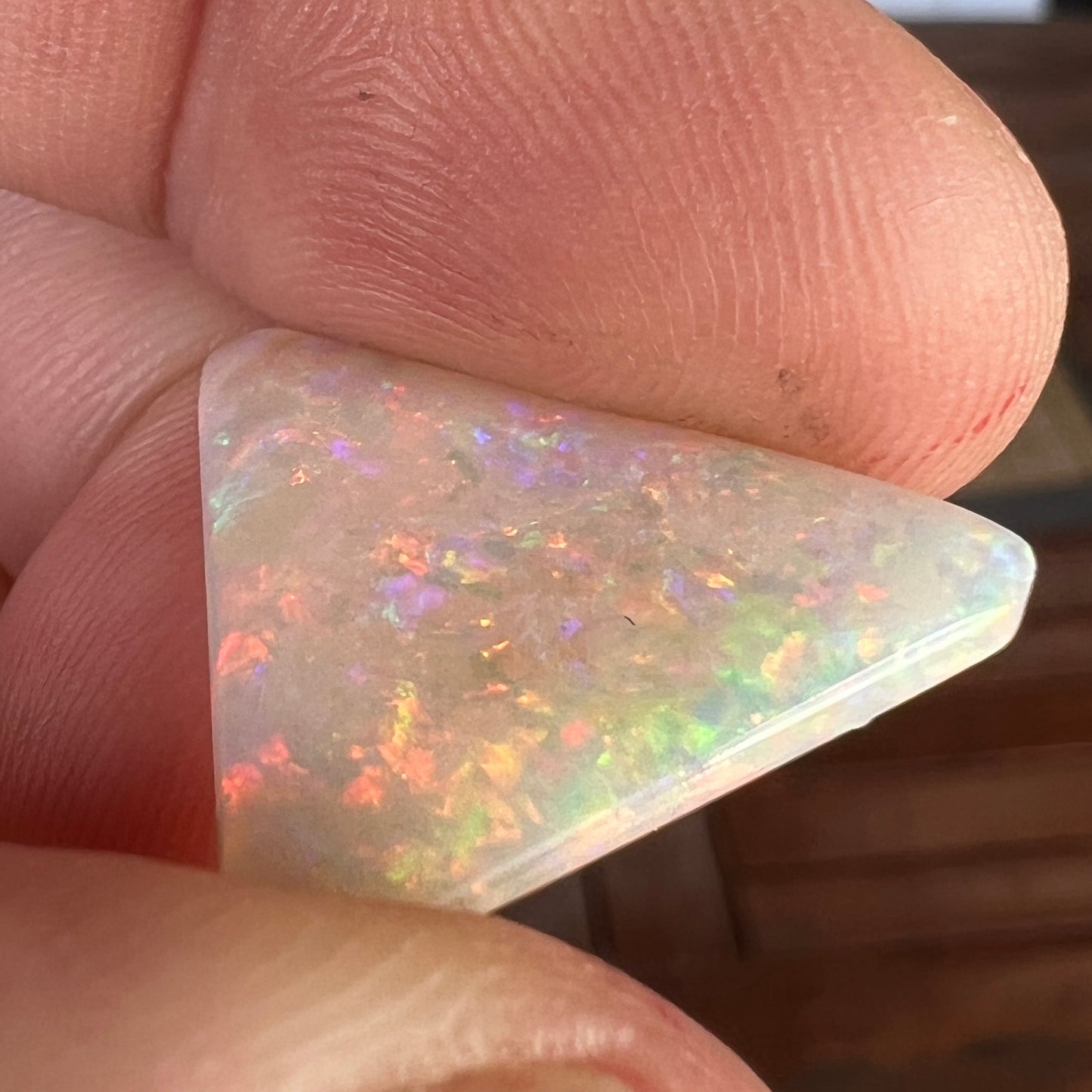 Lightning Ridge Crystal Opal. What a beauty! Great shape with all the colours. Ready to set into a ring or pendant.