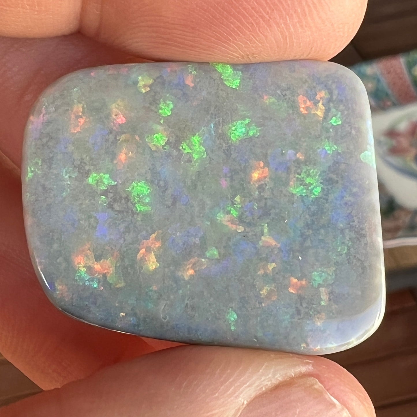 Lightning Ridge solid black opal, perfect pattern stone showing all colours. Outstanding cut and polish.