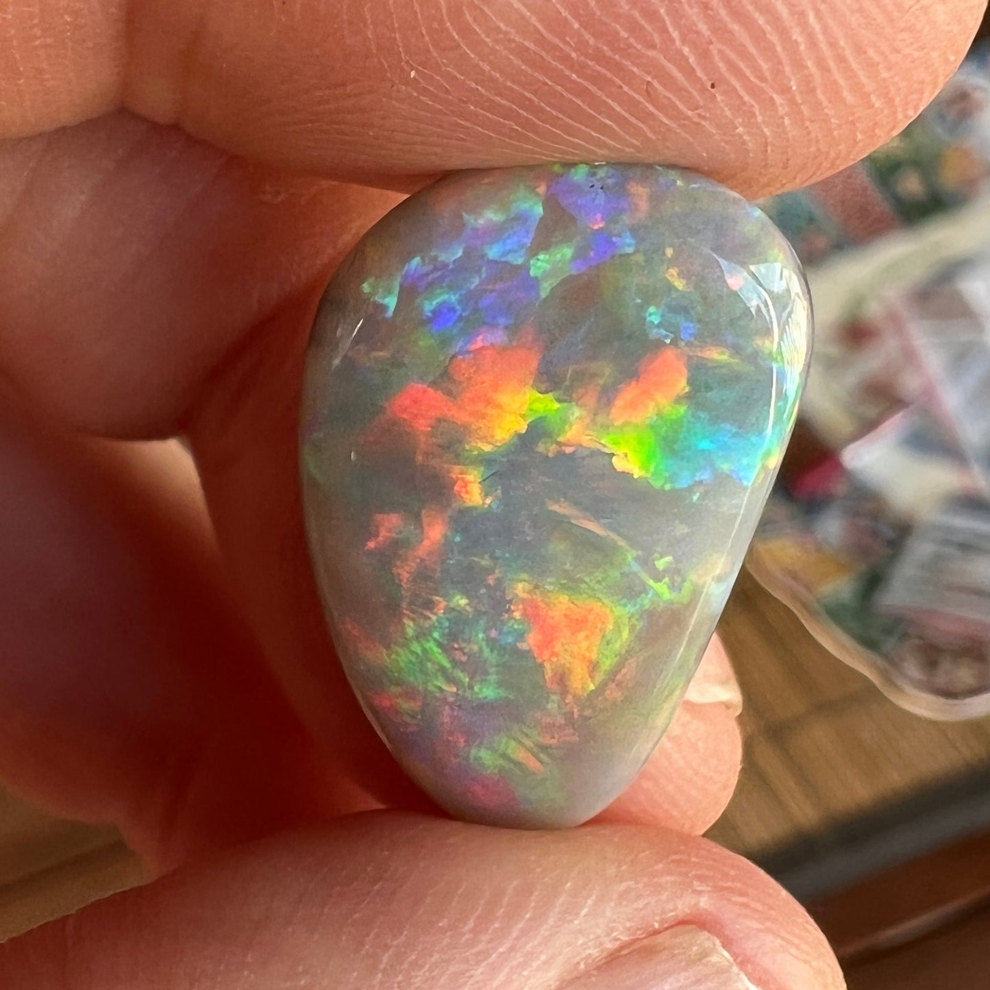 Solid Mintabie black opal. Beautiful specimen displaying a magnificent play of colour.