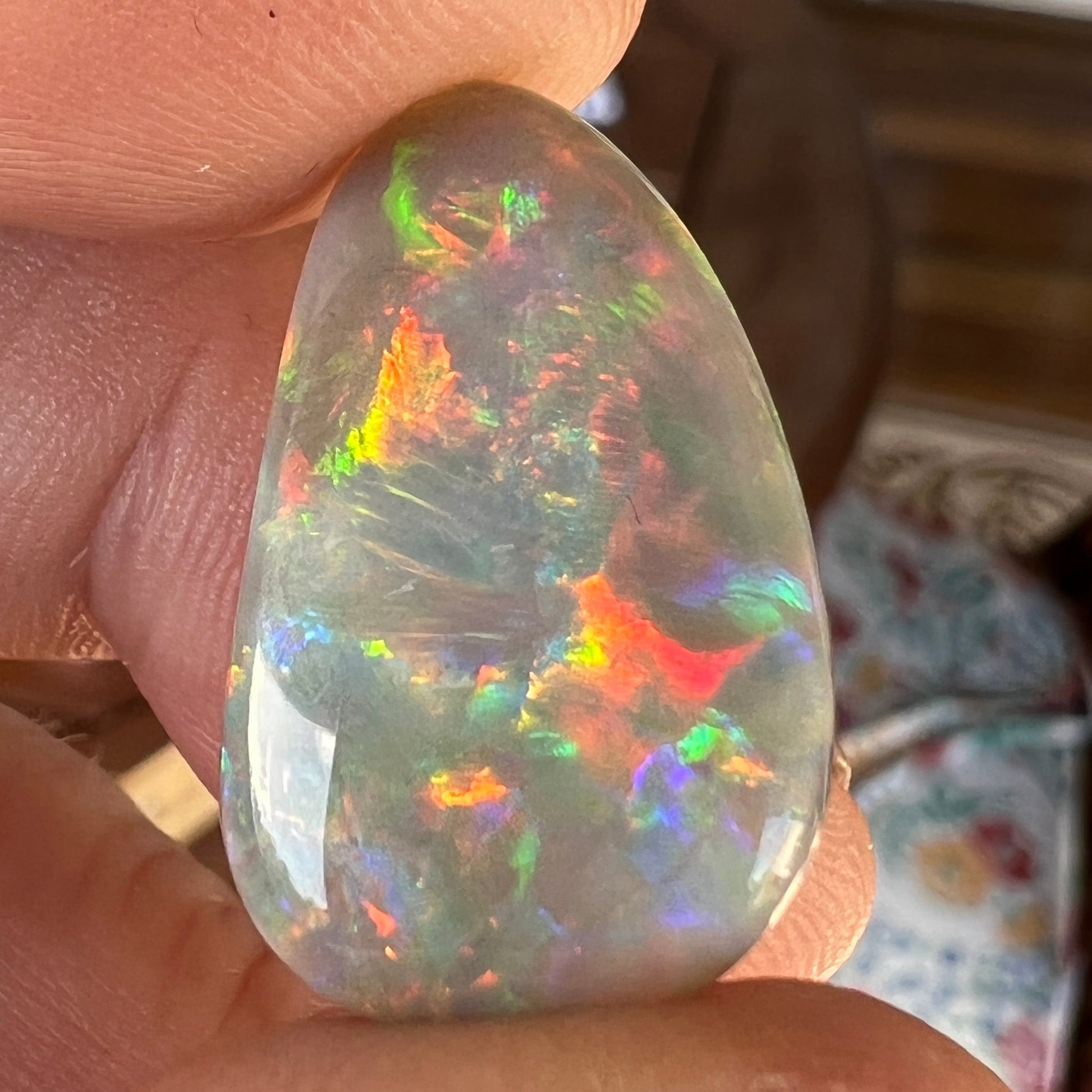 Solid Mintabie black opal. Beautiful specimen displaying a magnificent play of colour.