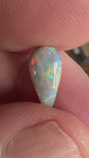 Rare Mintabie solid black opal. A perfect specimen displaying an impressive play of colour. Ready for that special person.