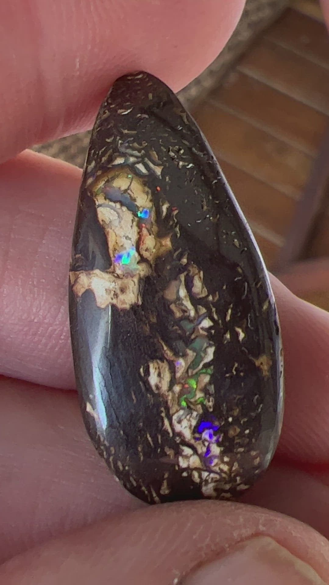 Great shaped boulder opal from Opalton, Queensland, with flashing colours.