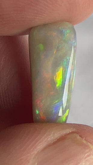 Absolutely stunning piece of rare Mintabie opal, displaying fiery colours from every angle.